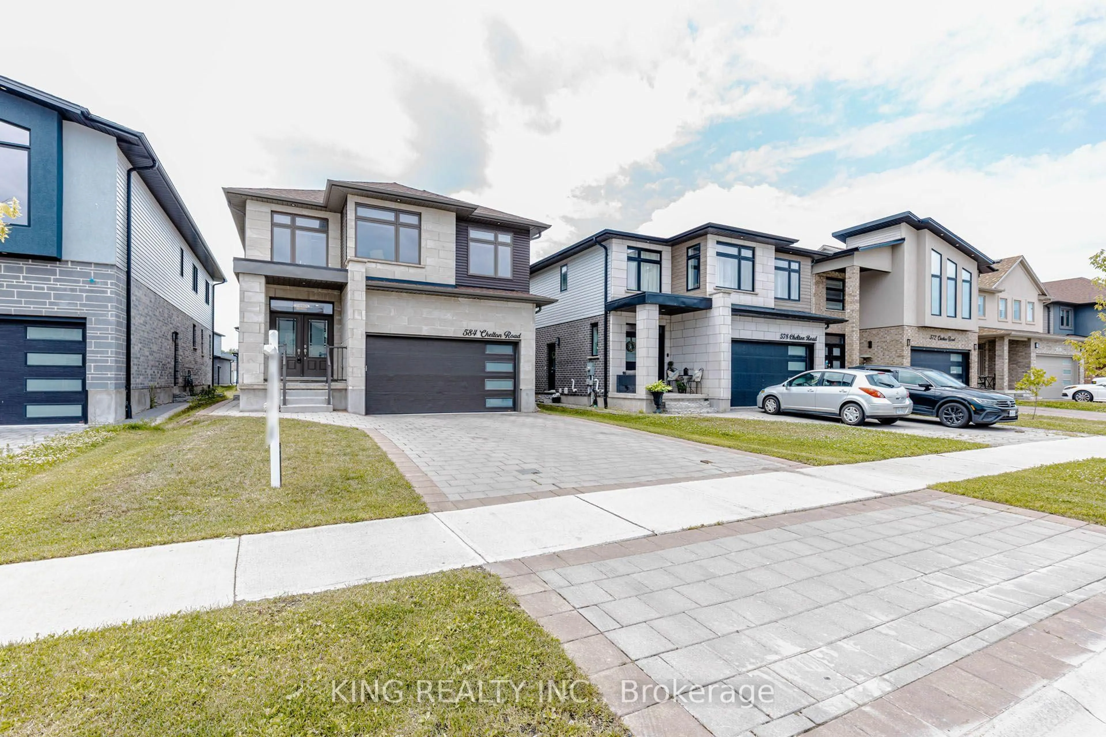 A pic from outside/outdoor area/front of a property/back of a property/a pic from drone, street for 584 Chelton Rd, London South Ontario N6M 0H7