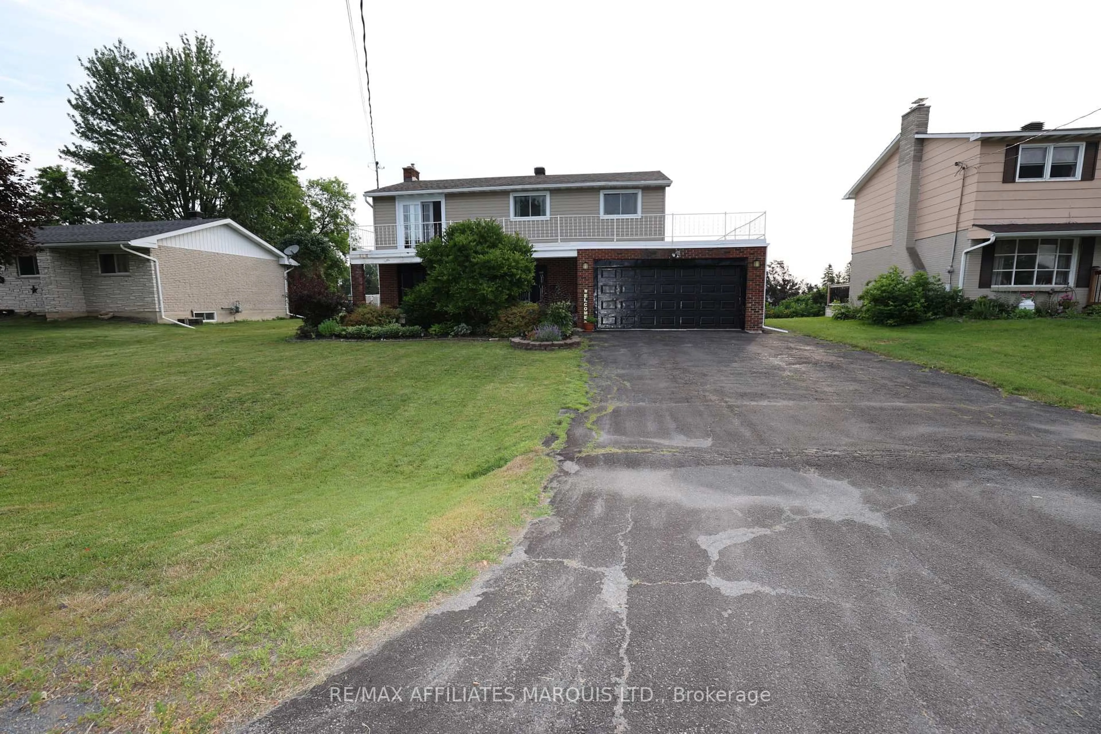 A pic from outside/outdoor area/front of a property/back of a property/a pic from drone, street for 3453 Bruce St, South Stormont Ontario K6K 1M8
