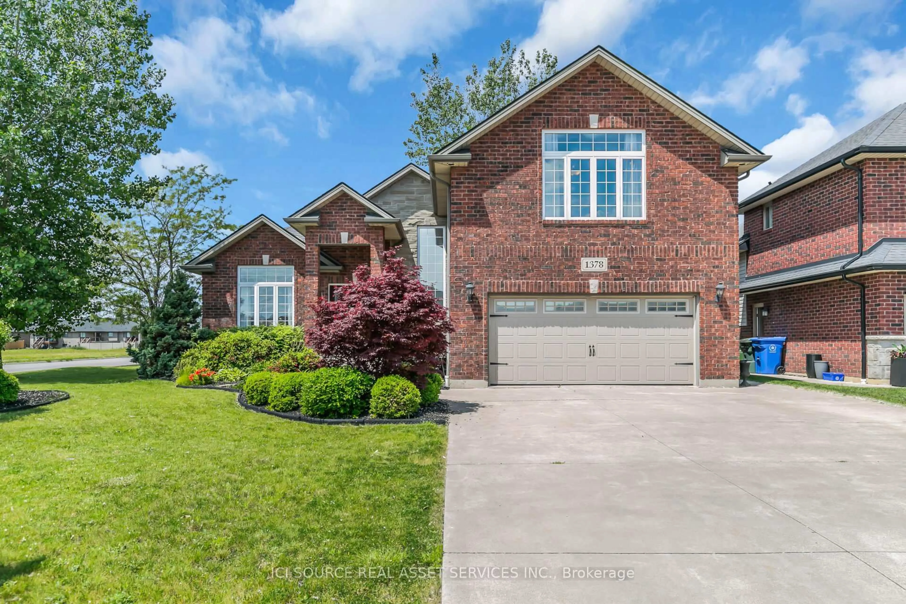 Home with brick exterior material, street for 1378 Traditional Tr, Lakeshore Ontario N0R 1A0