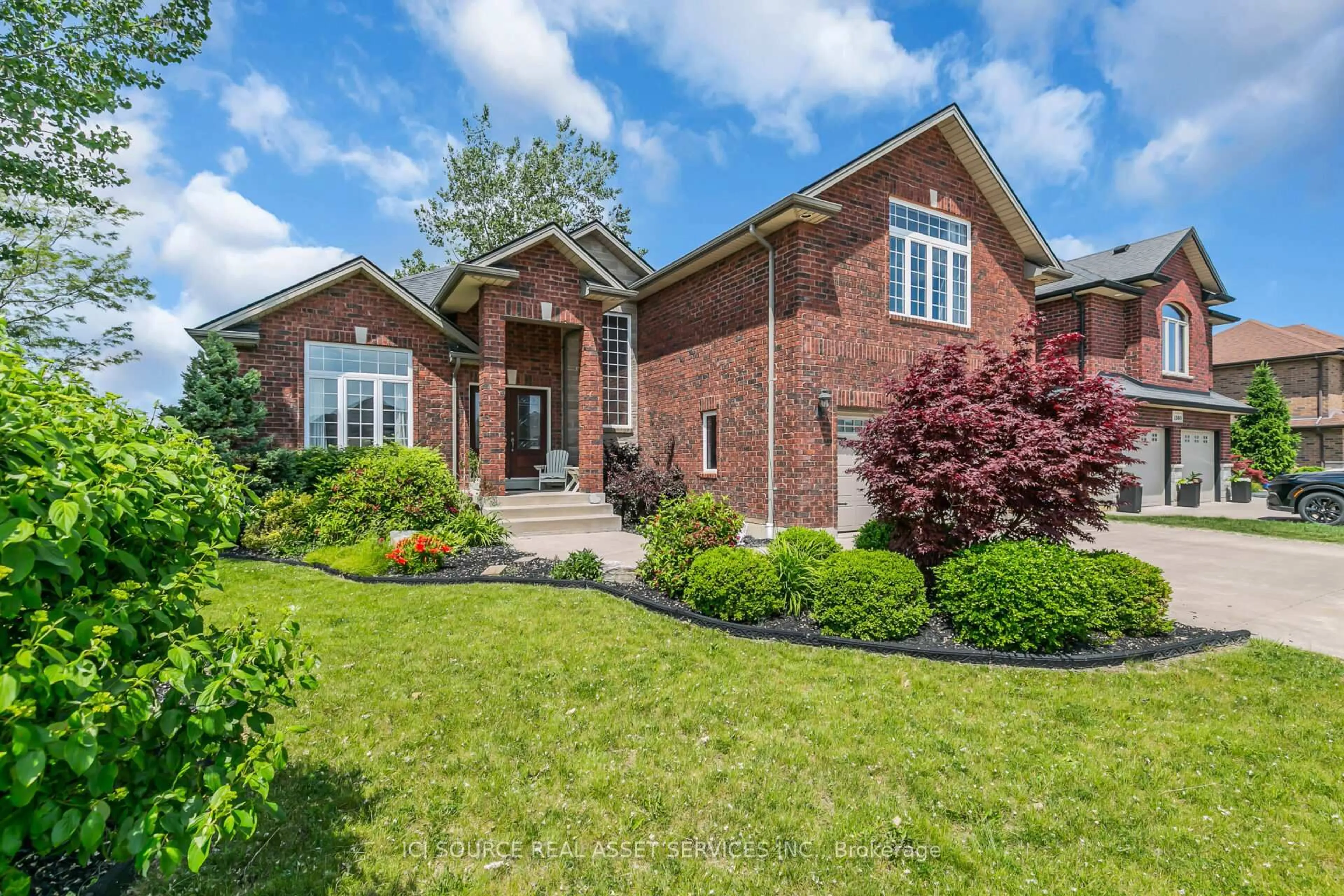 Home with brick exterior material, street for 1378 Traditional Tr, Lakeshore Ontario N0R 1A0