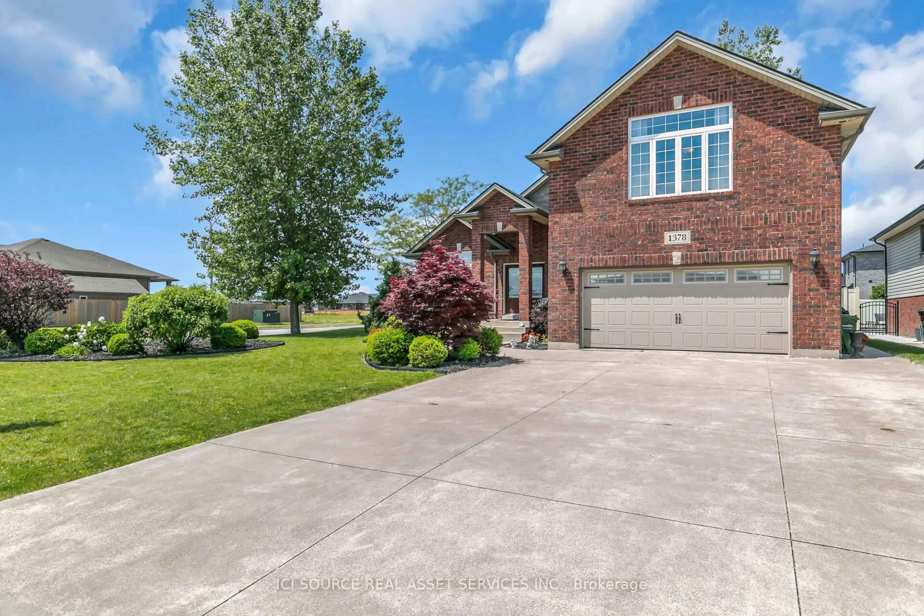 Home with brick exterior material, street for 1378 Traditional Tr, Lakeshore Ontario N0R 1A0