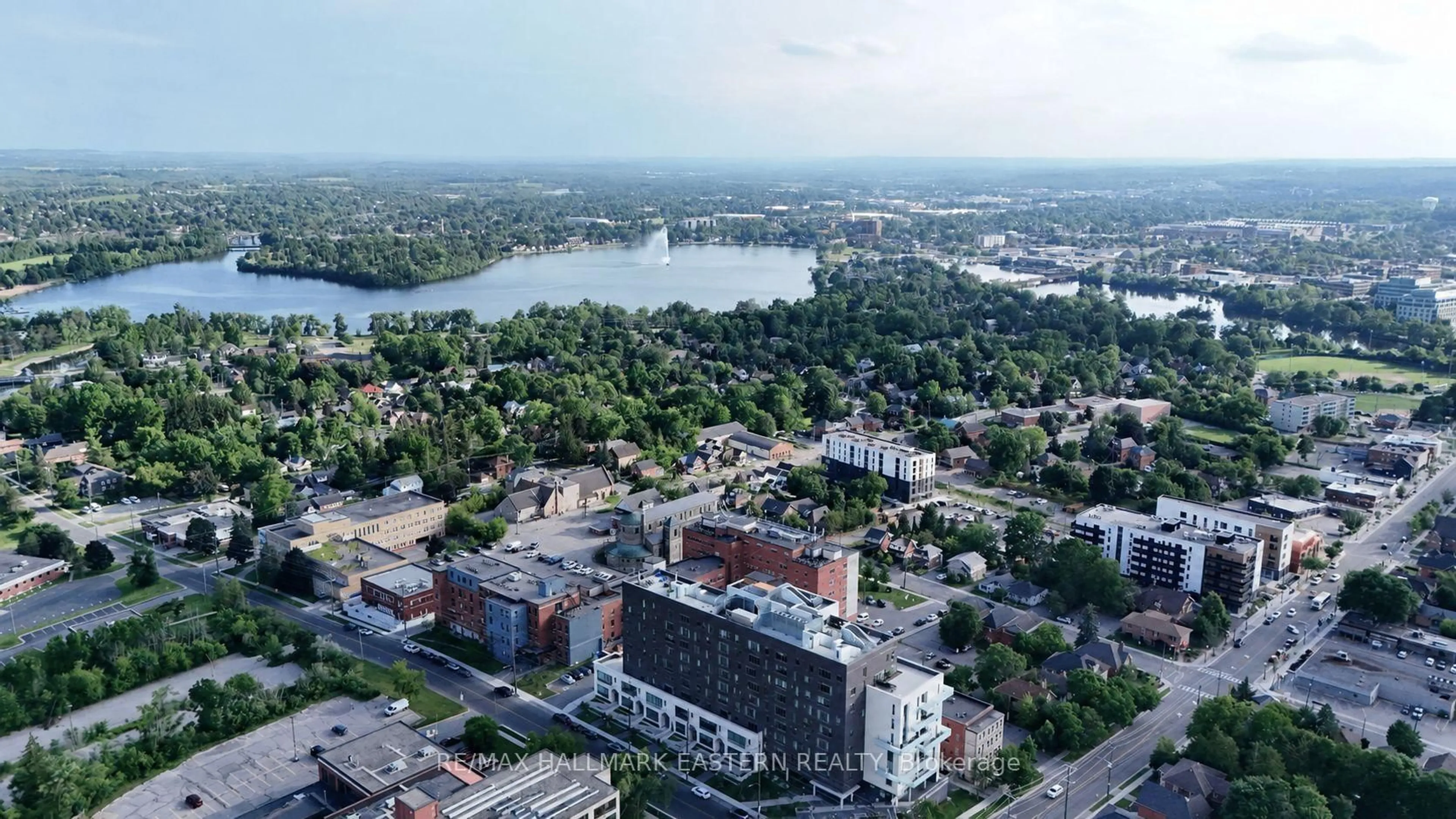 A pic from outside/outdoor area/front of a property/back of a property/a pic from drone, water/lake/river/ocean view for 195 Hunter St #308, Peterborough Ontario K9H 0K6