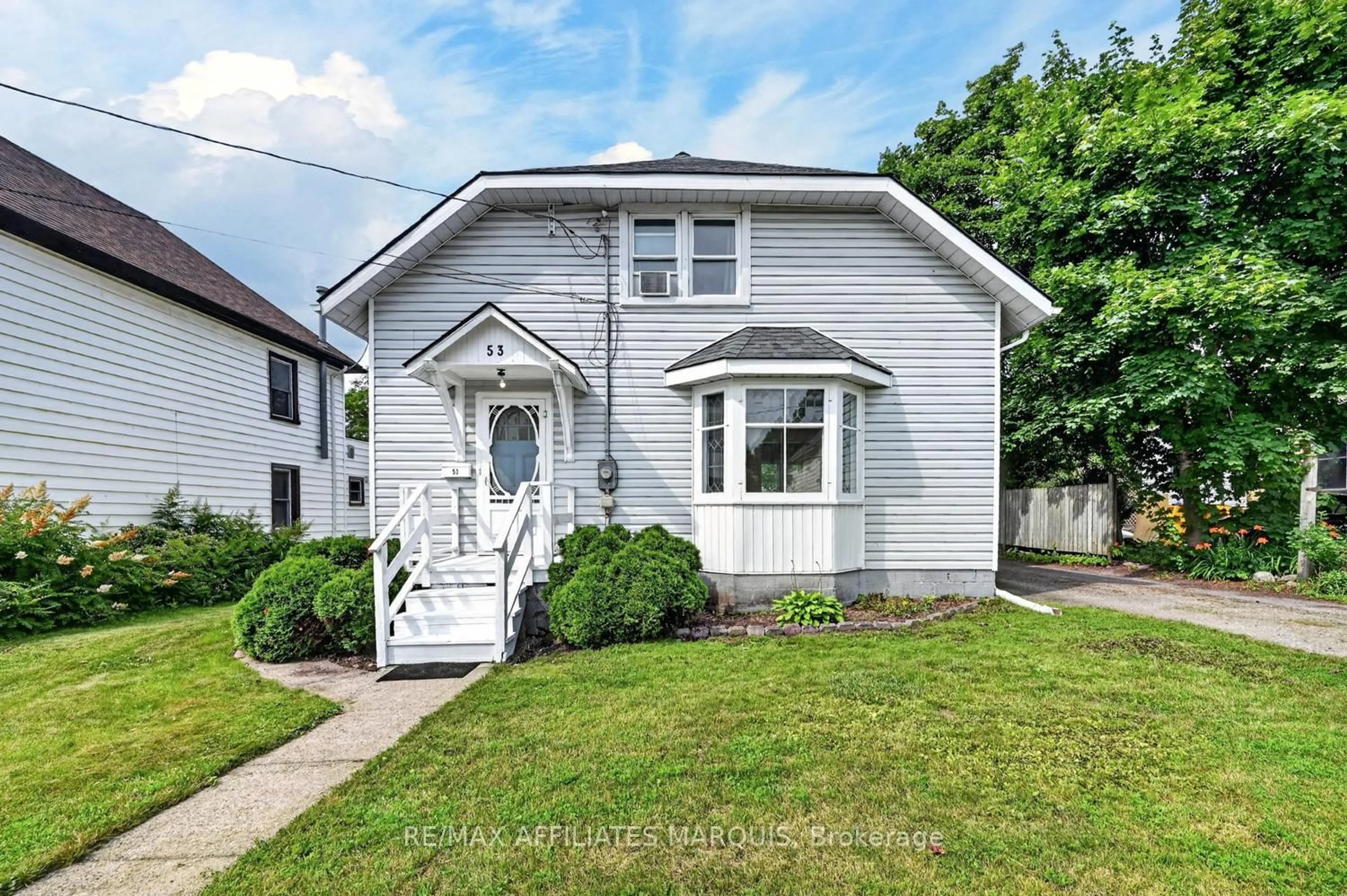 Home with vinyl exterior material, street for 53 Smiths Falls Ave, Smiths Falls Ontario K7A 3B2