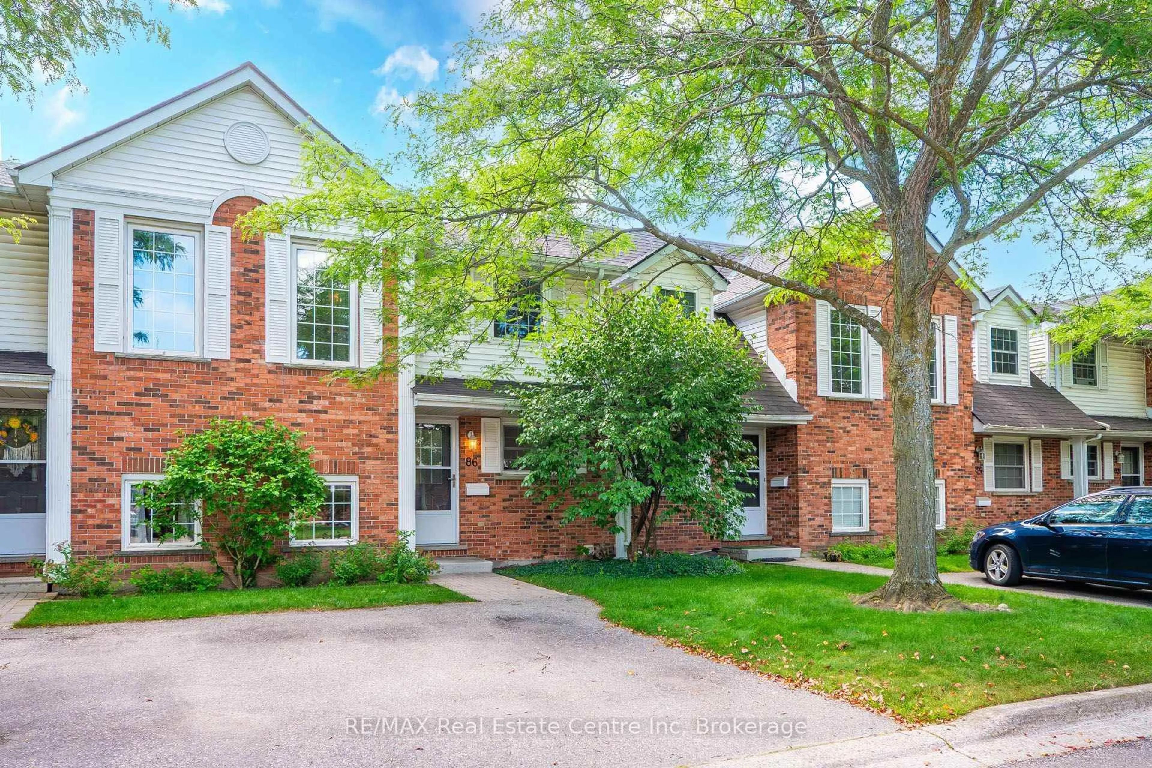 Home with brick exterior material, street for 129 Victoria Rd #86, Guelph Ontario N1E 6V4