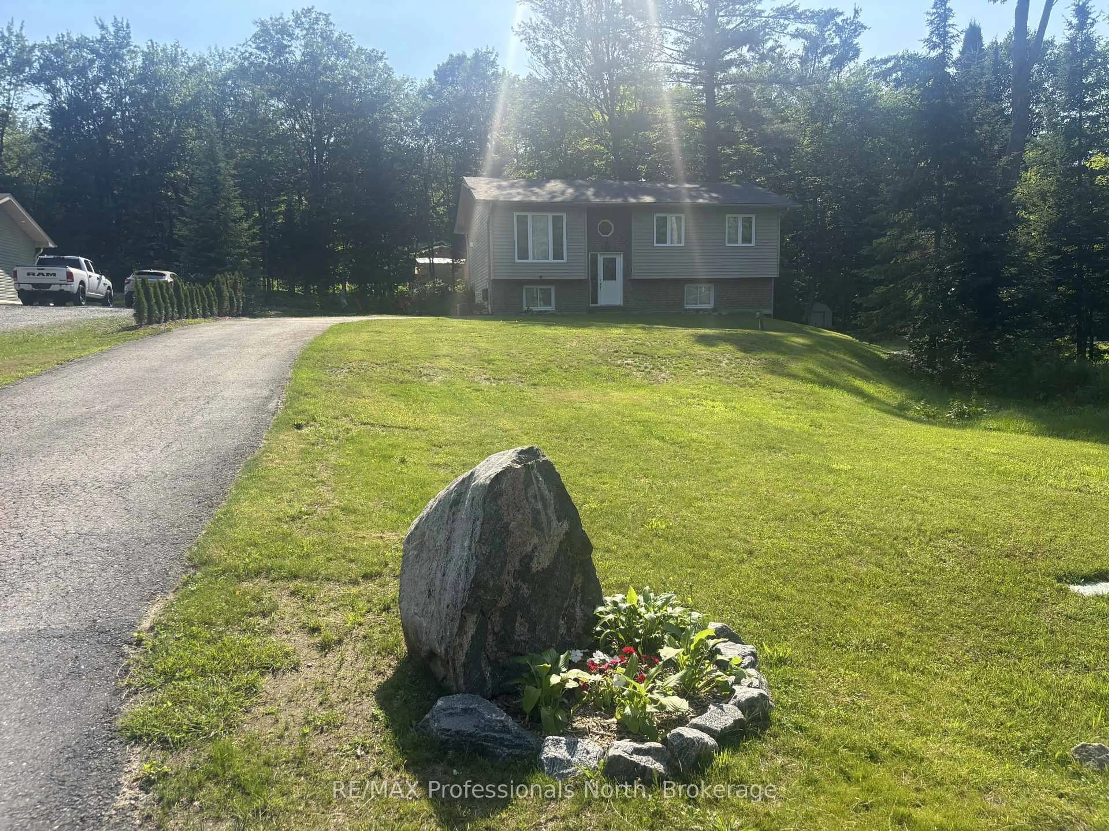 A pic from outside/outdoor area/front of a property/back of a property/a pic from drone, mountain view for 1036 Post Rd, Bracebridge Ontario P1L 1W9