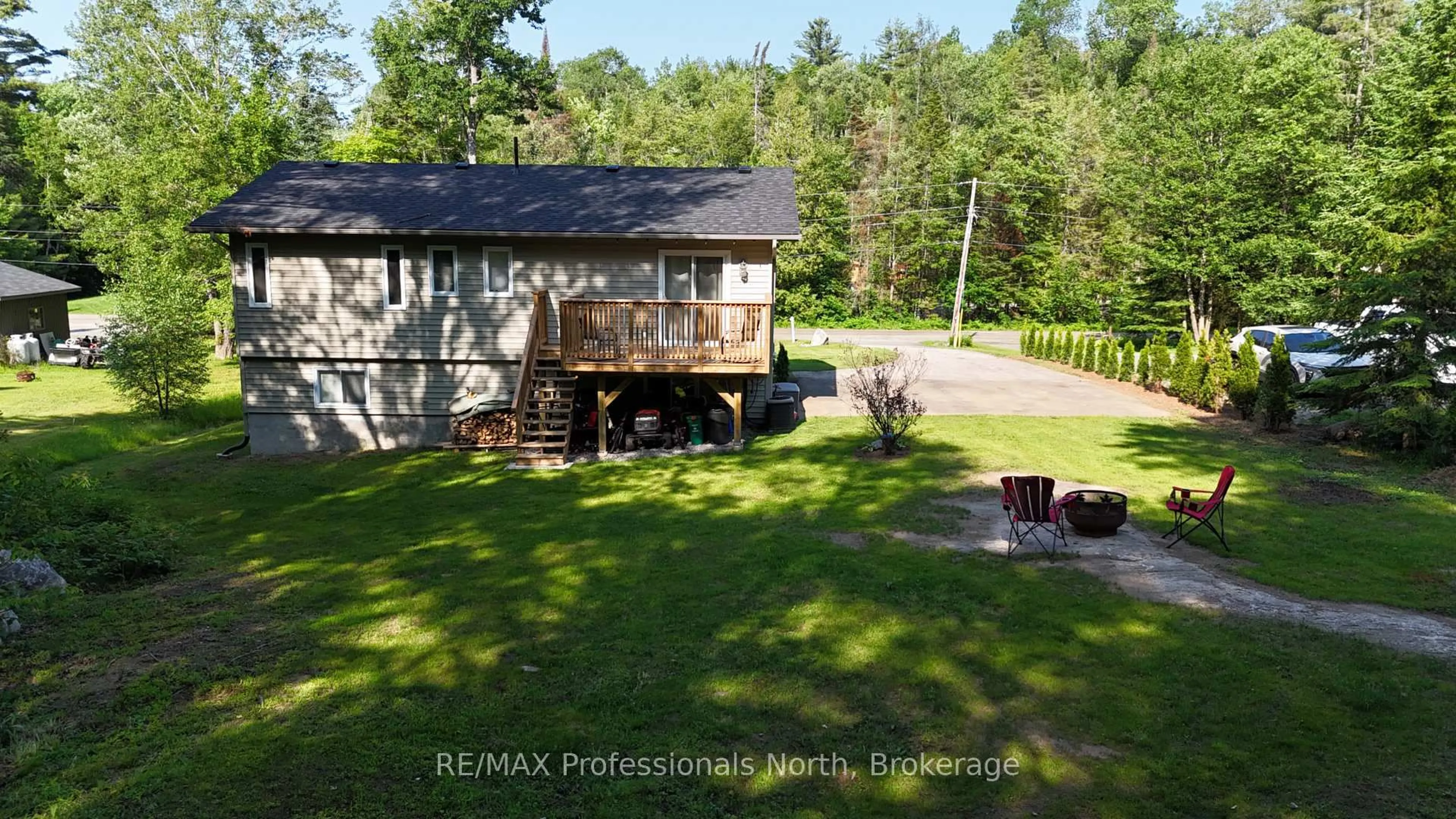 A pic from outside/outdoor area/front of a property/back of a property/a pic from drone, water/lake/river/ocean view for 1036 Post Rd, Bracebridge Ontario P1L 1W9