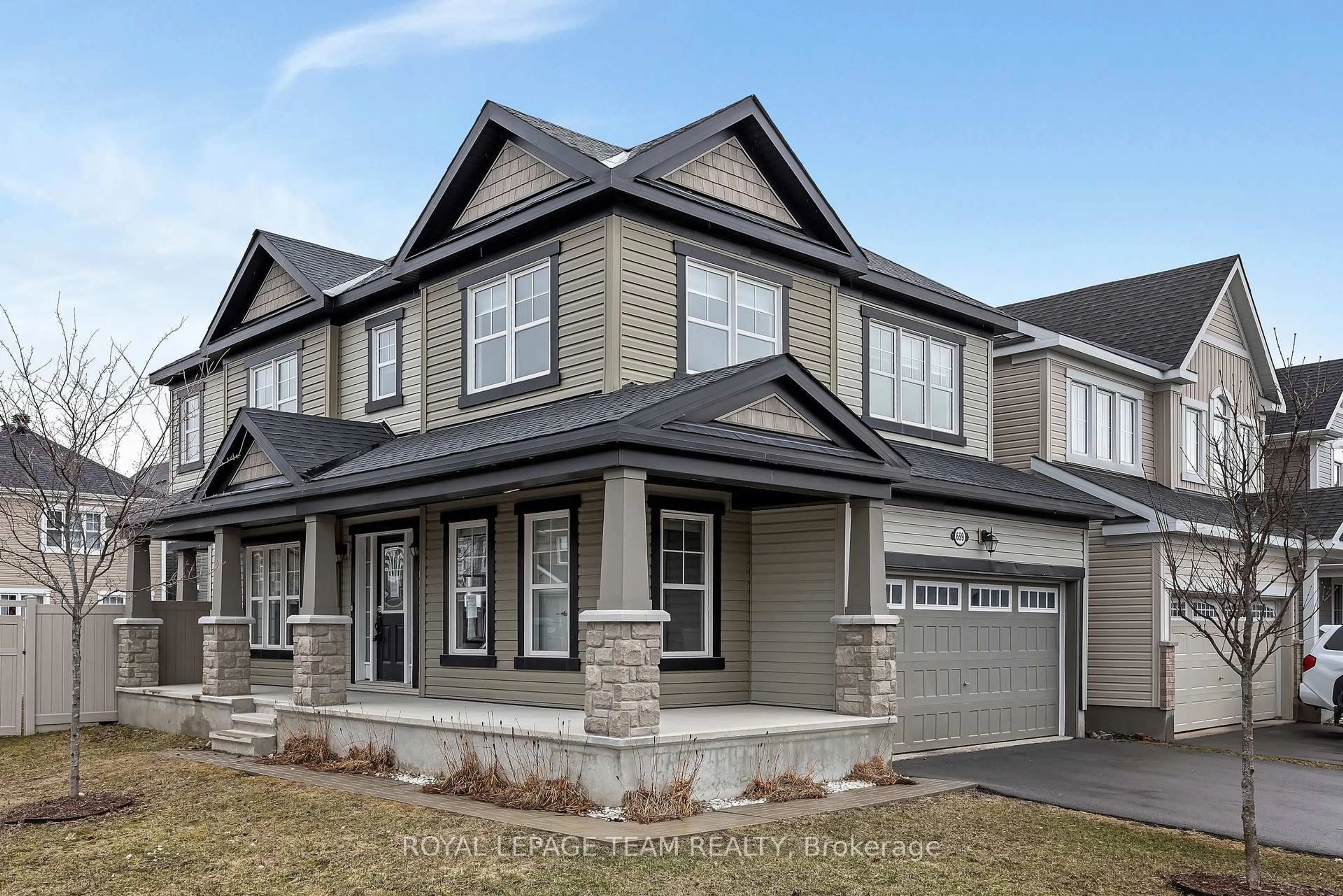 Home with vinyl exterior material, street for 659 Pearl Dace Cres, Ottawa Ontario K2J 6K4