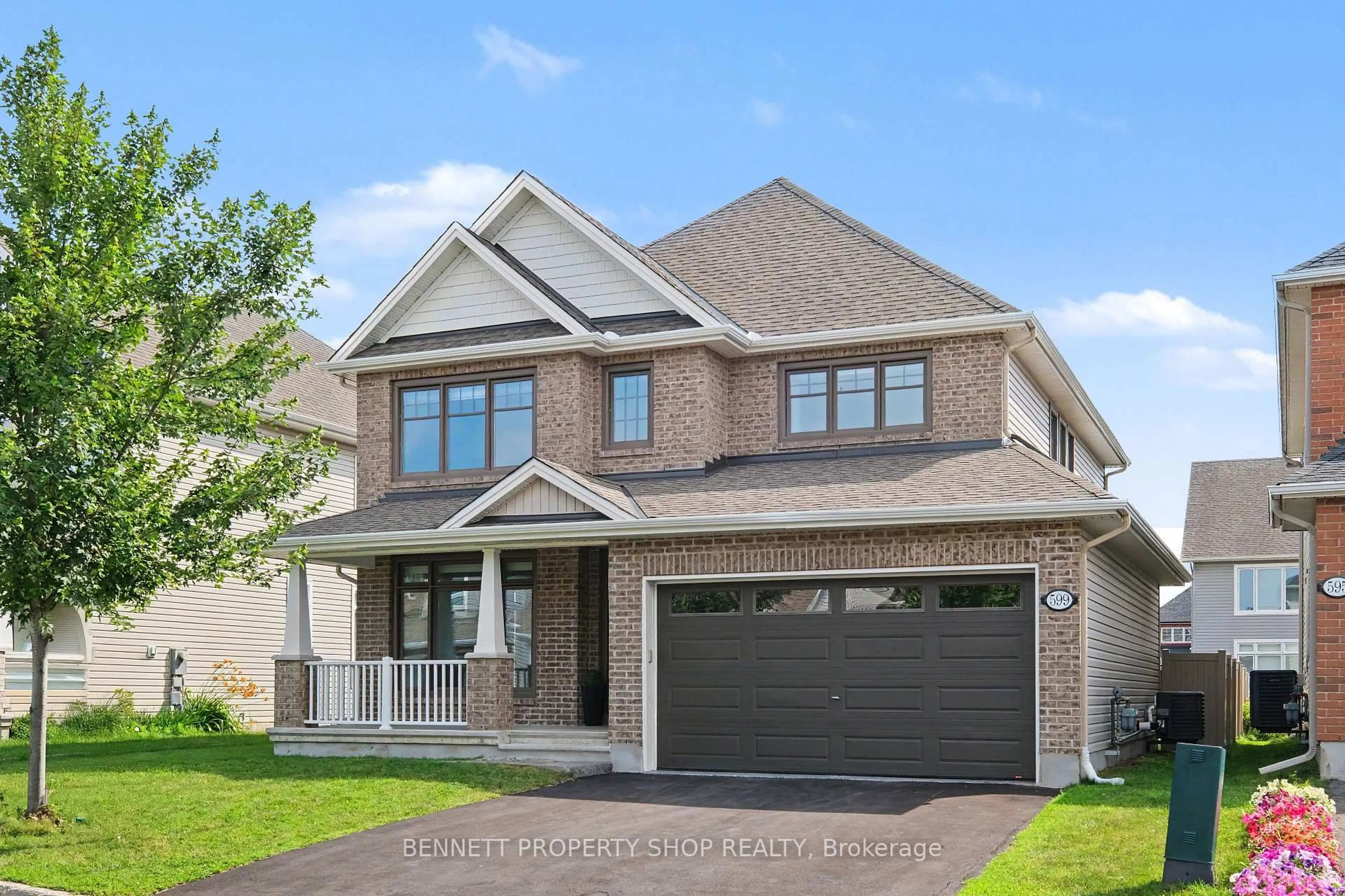Home with brick exterior material, street for 599 Rockrose Way, Ottawa Ontario K1T 3T8