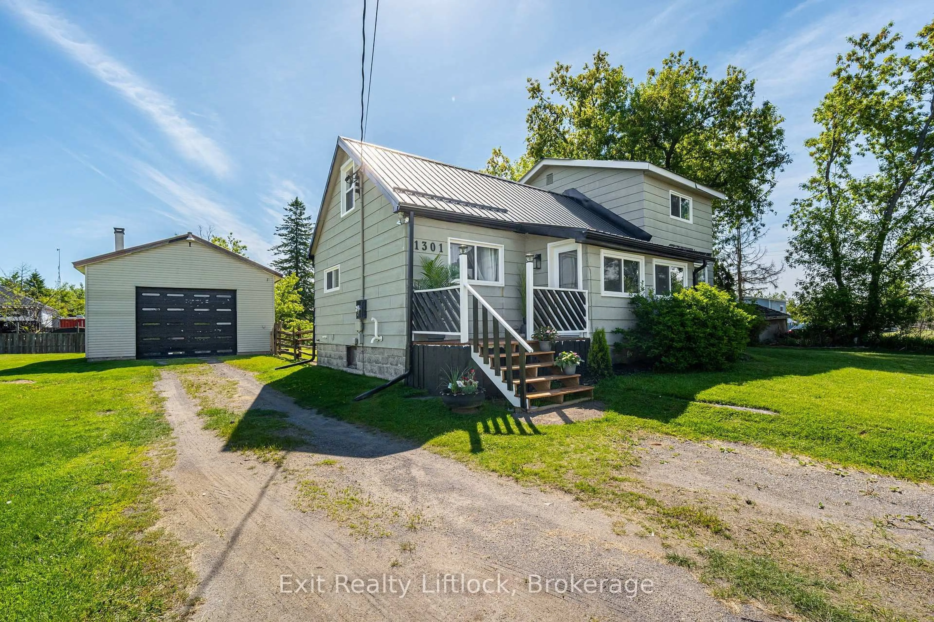 A pic from outside/outdoor area/front of a property/back of a property/a pic from drone, street for 1301 County Rd 28, Otonabee-South Monaghan Ontario K0L 1V0