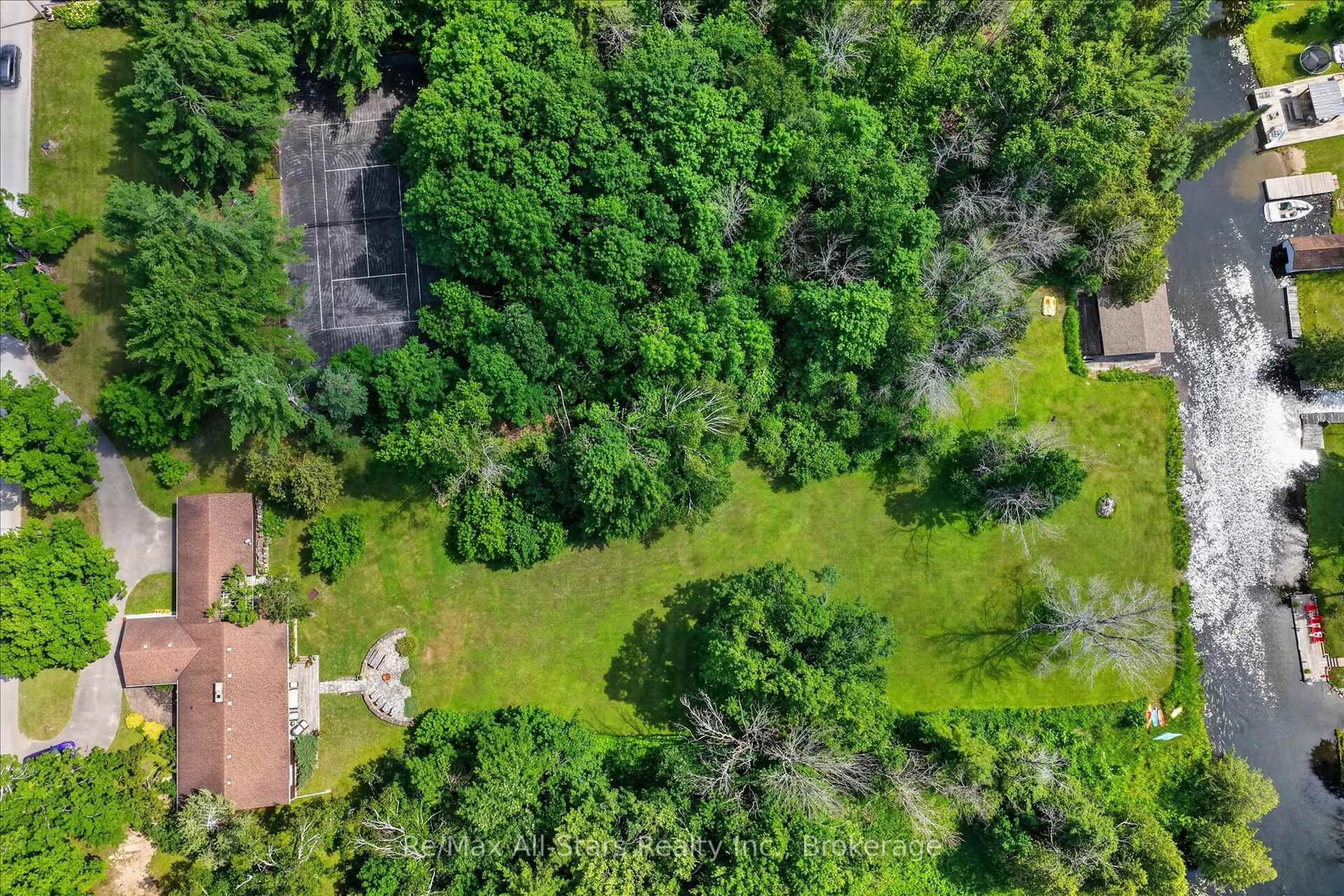 A pic from outside/outdoor area/front of a property/back of a property/a pic from drone, forest/trees view for 85 Grandy Rd, Kawartha Lakes Ontario K0M 1K0