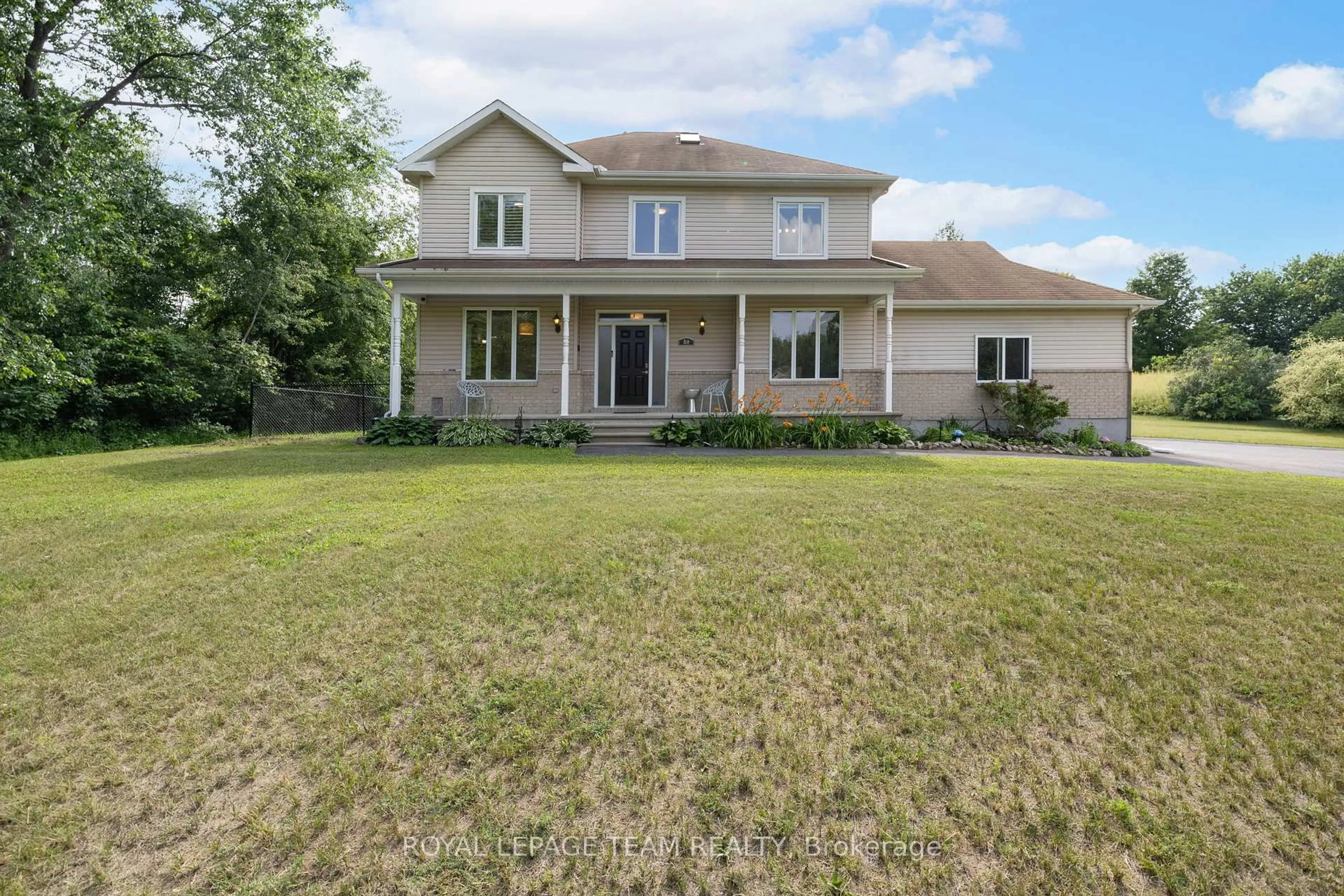 A pic from outside/outdoor area/front of a property/back of a property/a pic from drone, street for 59 Empress Dr, North Grenville Ontario K0G 1J0