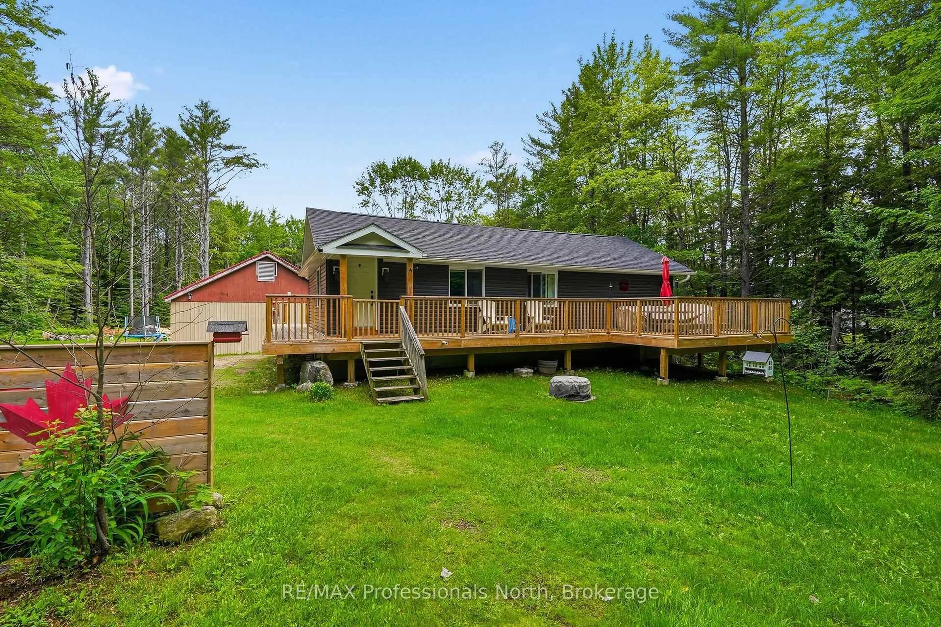 A pic from outside/outdoor area/front of a property/back of a property/a pic from drone, water/lake/river/ocean view for 264 Stephenson 4 Rd, Huntsville Ontario P0B 1M0