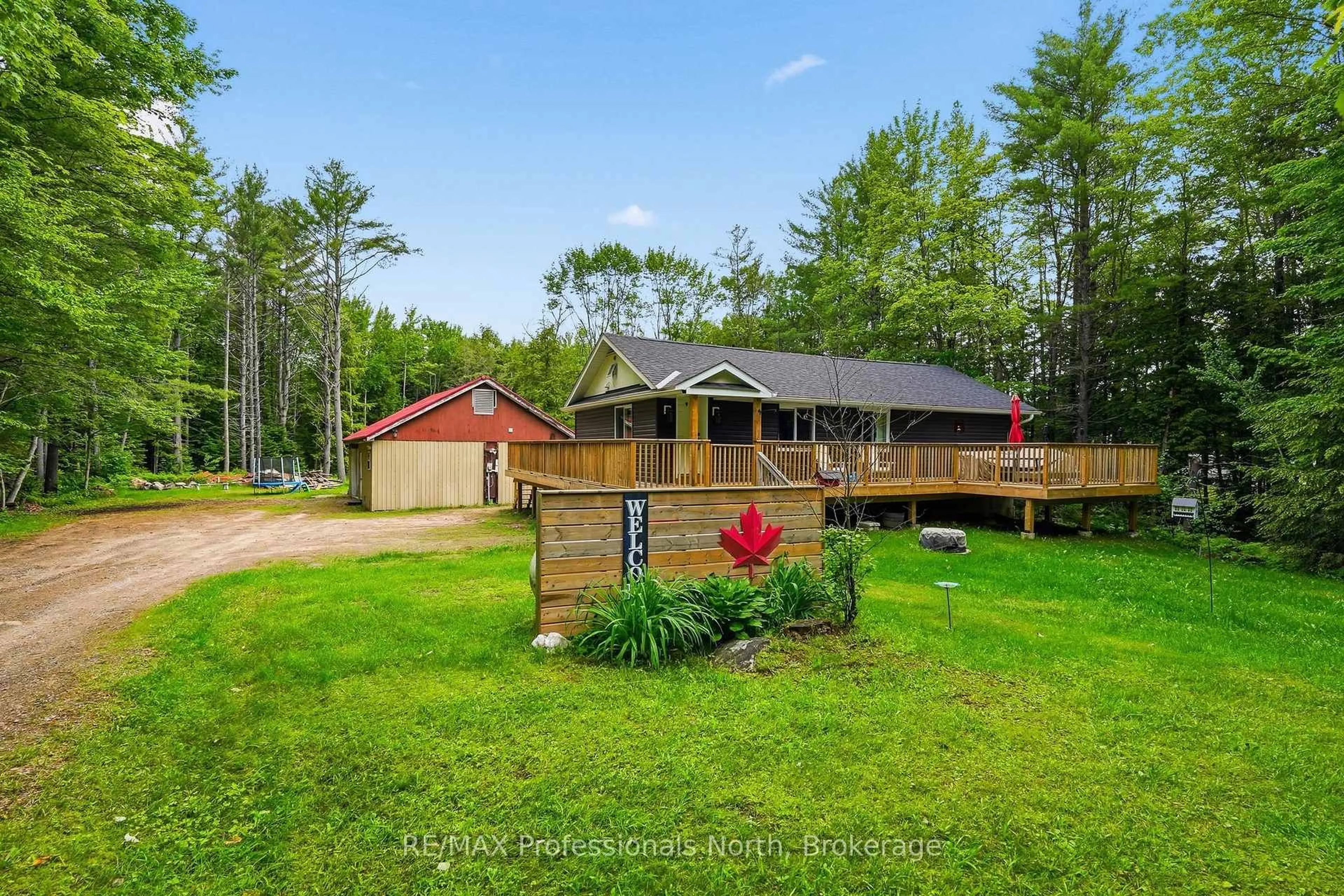 A pic from outside/outdoor area/front of a property/back of a property/a pic from drone, water/lake/river/ocean view for 264 Stephenson 4 Rd, Huntsville Ontario P0B 1M0