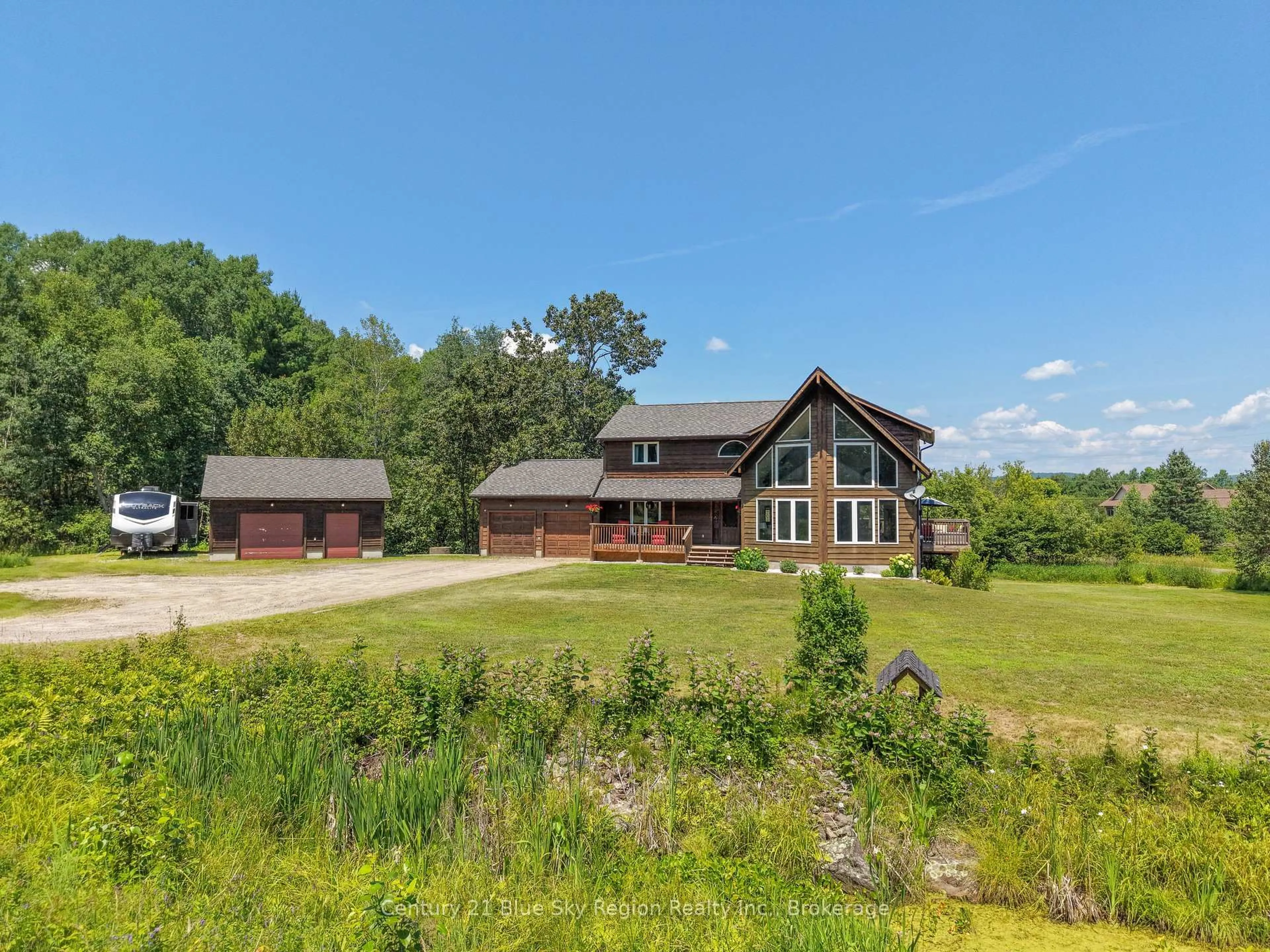 A pic from outside/outdoor area/front of a property/back of a property/a pic from drone, unknown for 1033 Centennial Cres, East Ferris Ontario P0H 1K0
