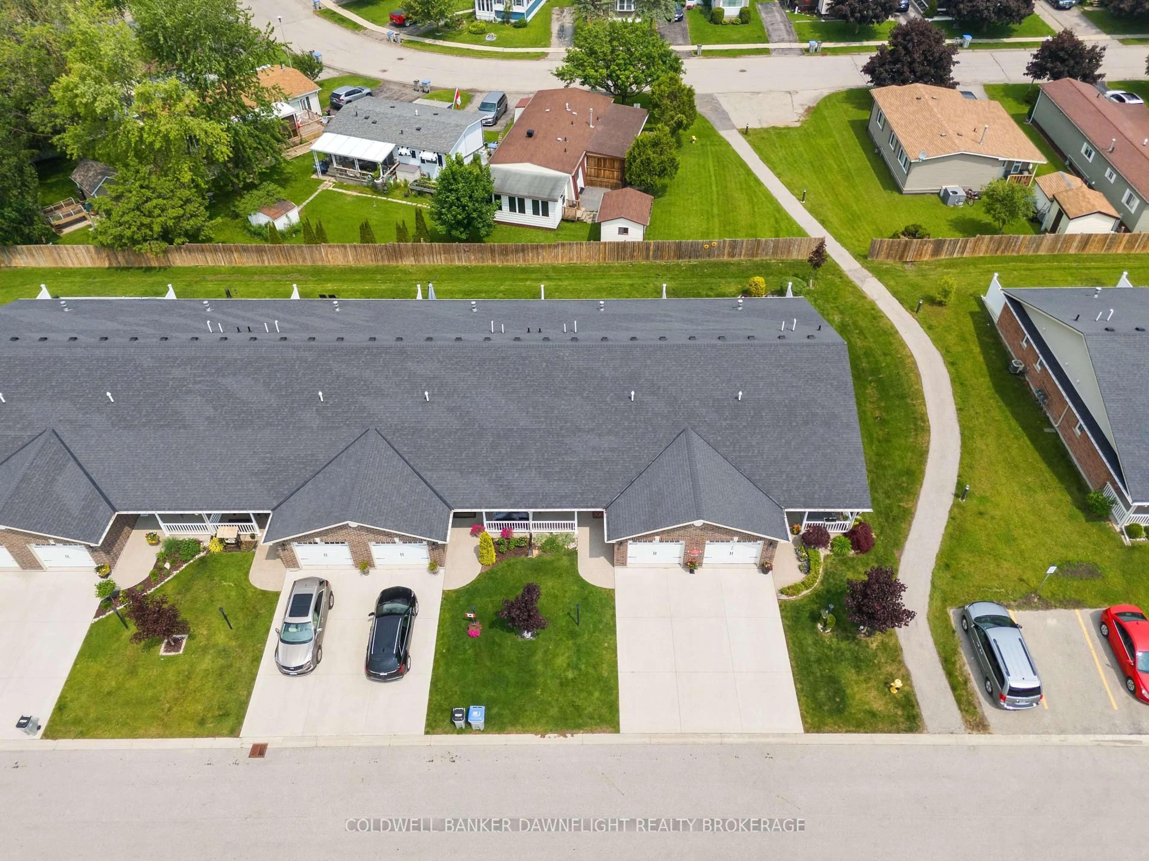 A pic from outside/outdoor area/front of a property/back of a property/a pic from drone, street for 40 Devon Dr, South Huron Ontario N0M 1S3
