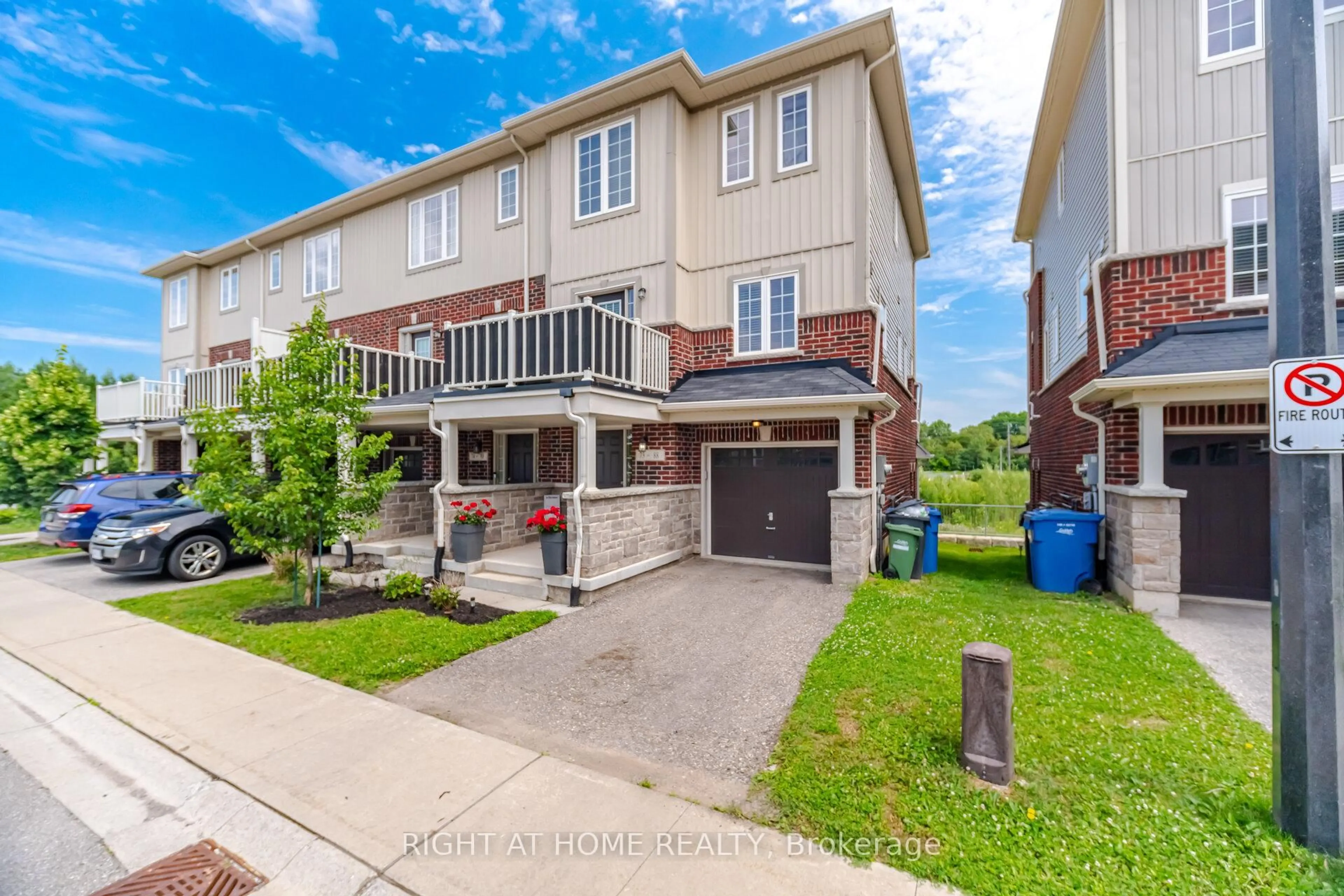 A pic from outside/outdoor area/front of a property/back of a property/a pic from drone, street for 88 Decorso Dr #73, Guelph Ontario N1L 0A1