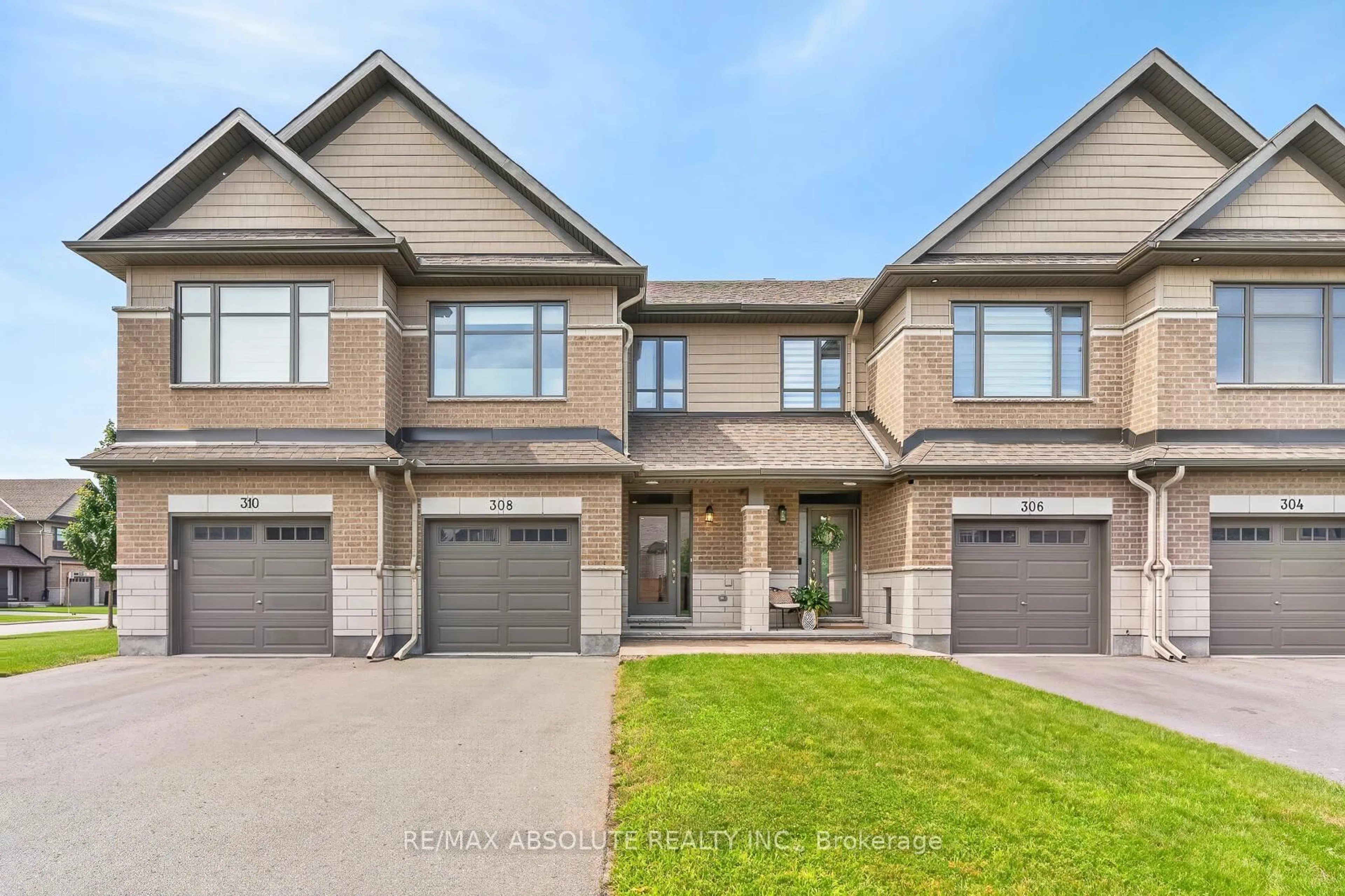 Home with brick exterior material, street for 308 Proud Walk Dr, Stittsville Ontario K2S 2L6