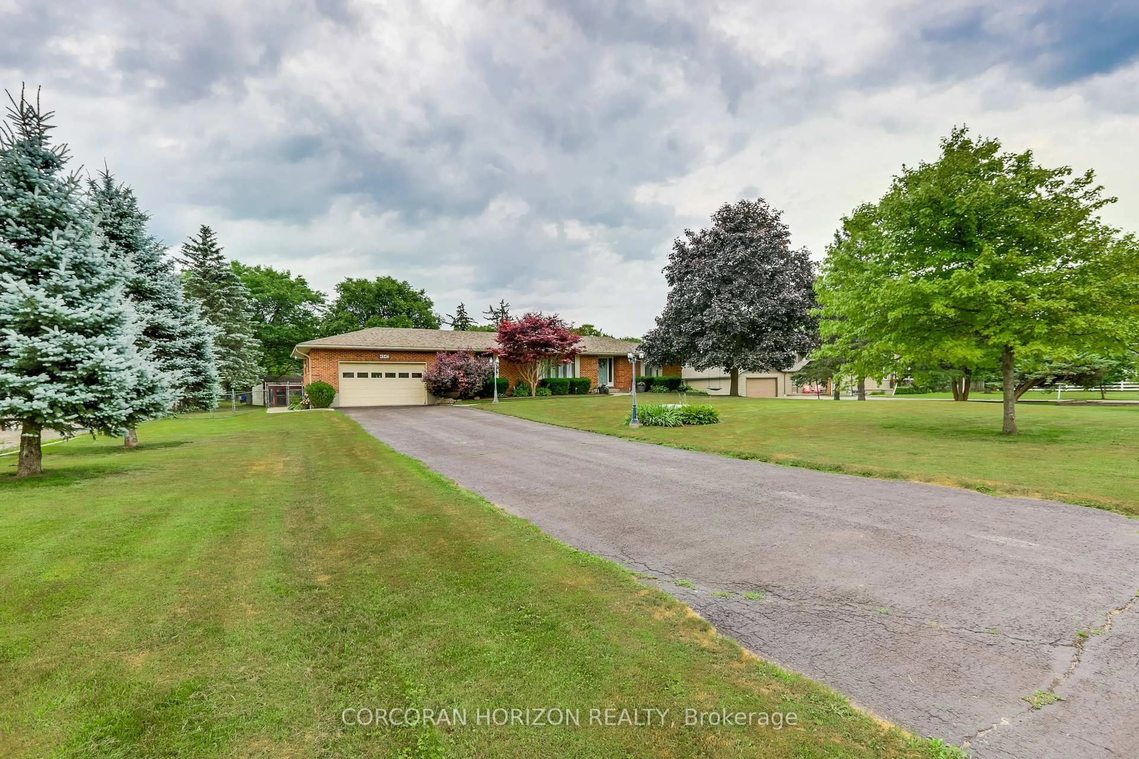 A pic from outside/outdoor area/front of a property/back of a property/a pic from drone, street for 4542 Avenue Rd, London South Ontario N6N 1E7