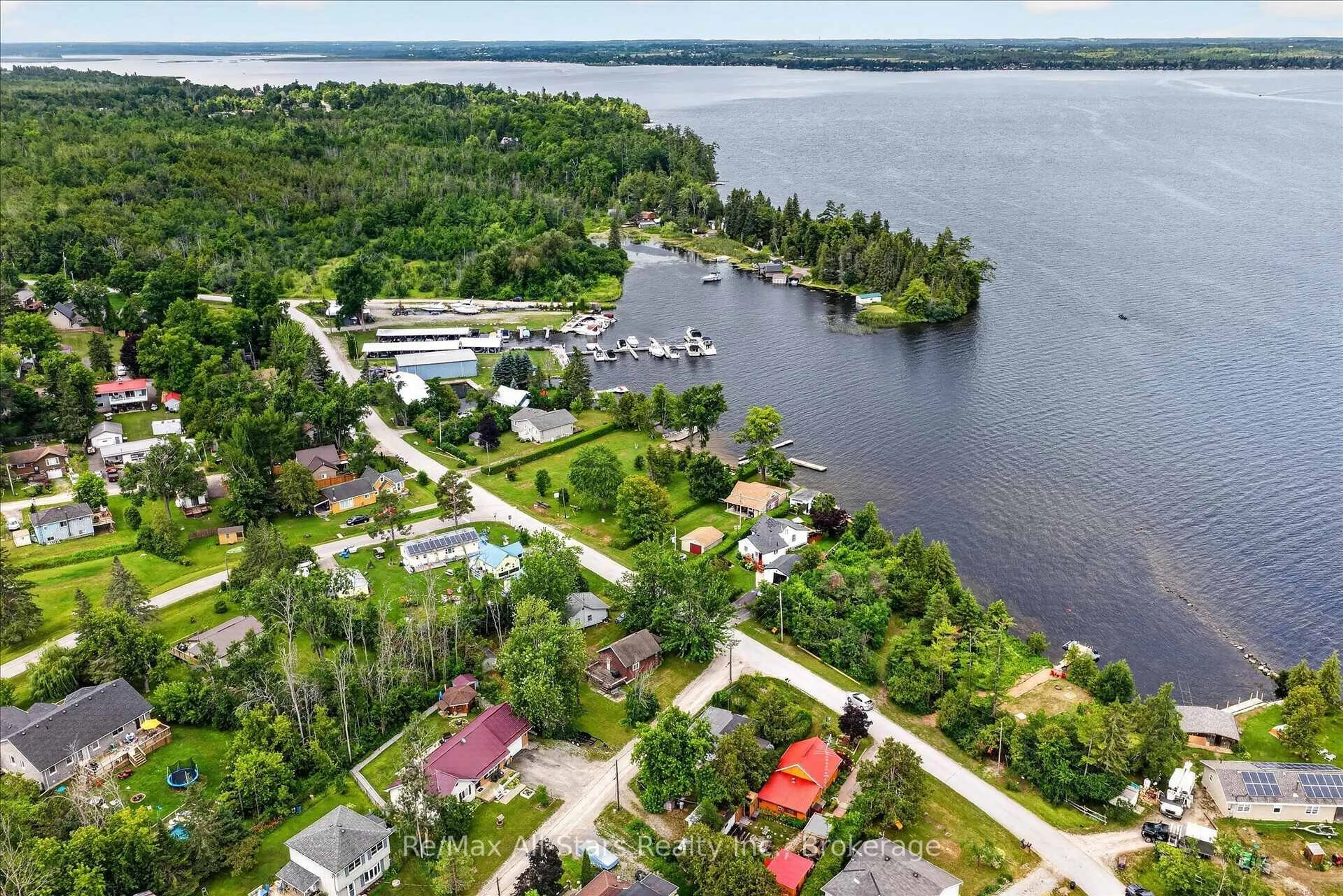 A pic from outside/outdoor area/front of a property/back of a property/a pic from drone, water/lake/river/ocean view for 3 Leaf St, Kawartha Lakes Ontario K0M 1L0