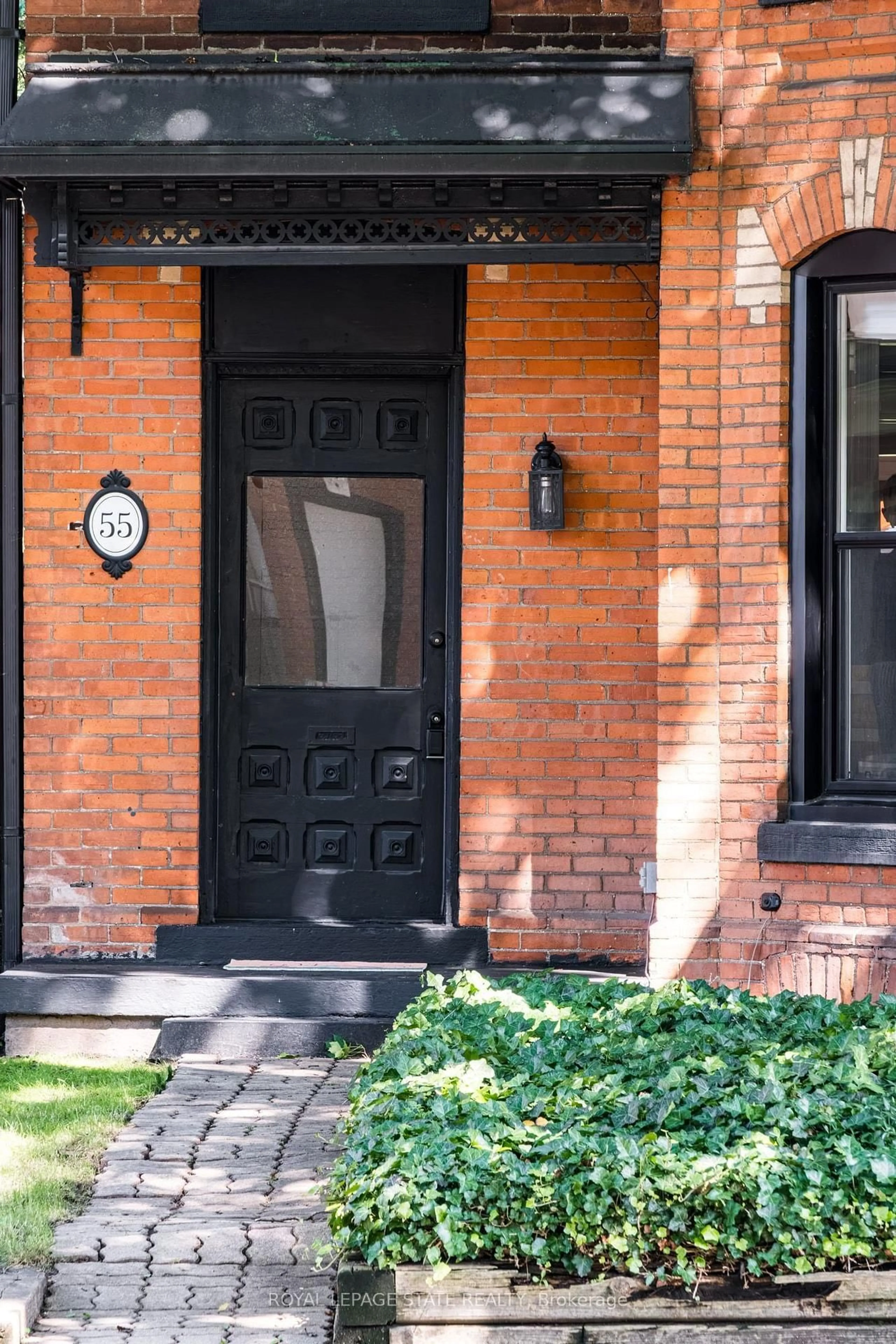 Home with brick exterior material, street for 55 Erie Ave, Hamilton Ontario L8N 2W5