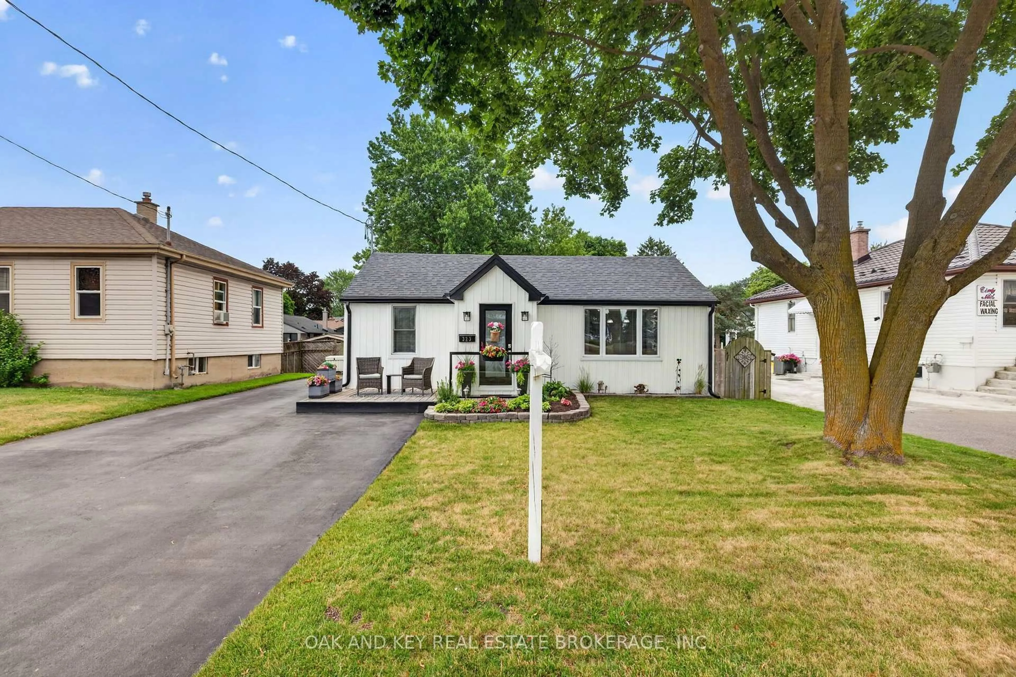 Home with vinyl exterior material, street for 323 Clarke Rd, London East Ontario N5W 5G3