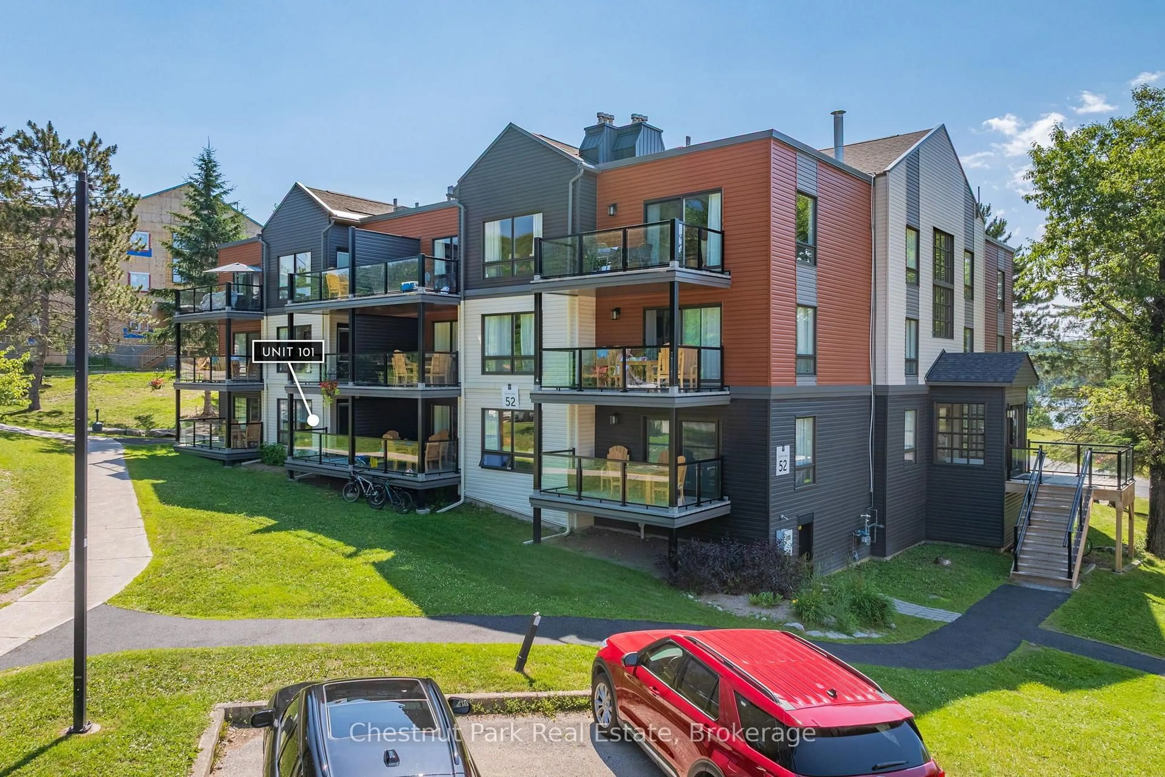 A pic from outside/outdoor area/front of a property/back of a property/a pic from drone, unknown for 1235 Deerhurst Summit Dr #52-101, Huntsville Ontario P1H 2E8