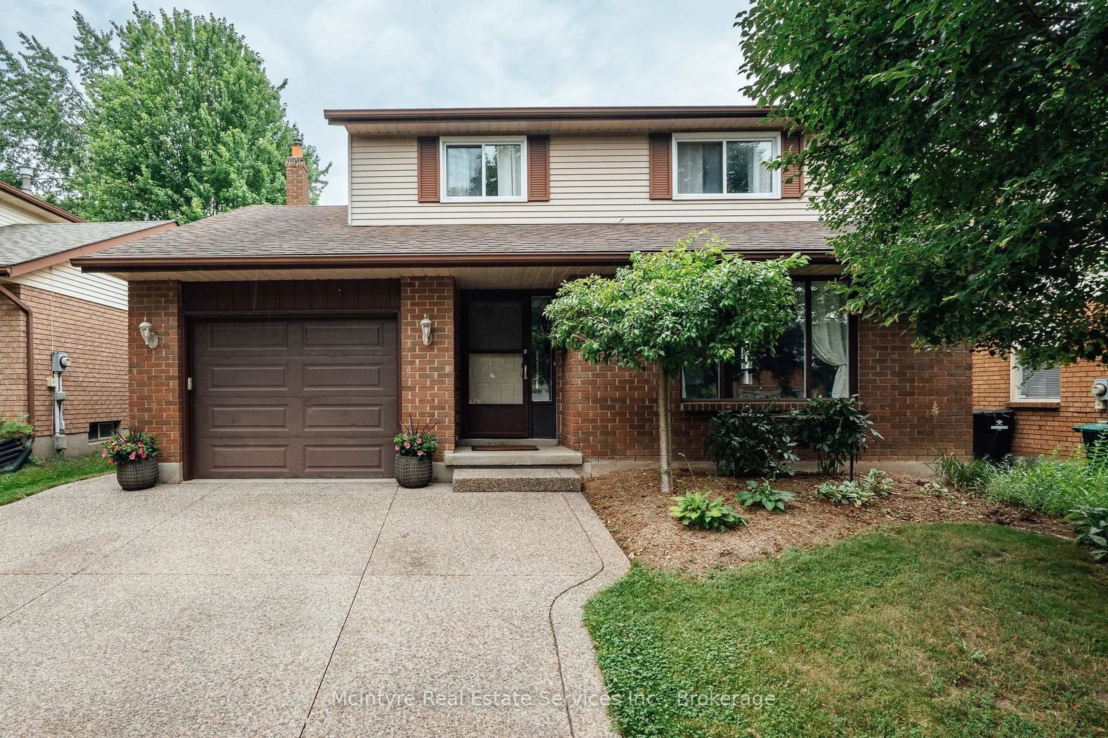 Home with brick exterior material, street for 277 Canterbury Dr, Waterloo Ontario N2K 3C4