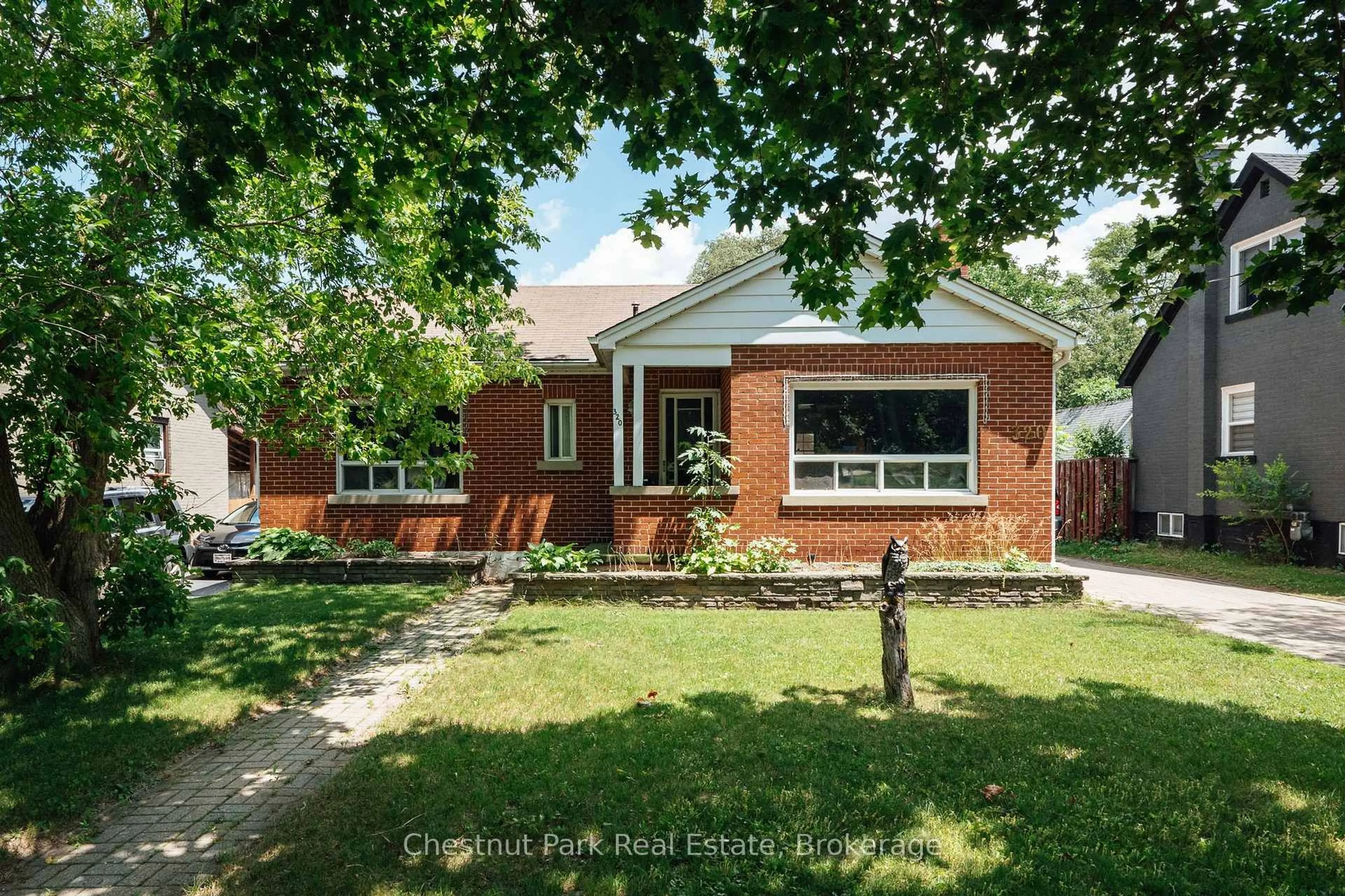 Home with brick exterior material, street for 320 St Leger St, Kitchener Ontario N2H 4M7