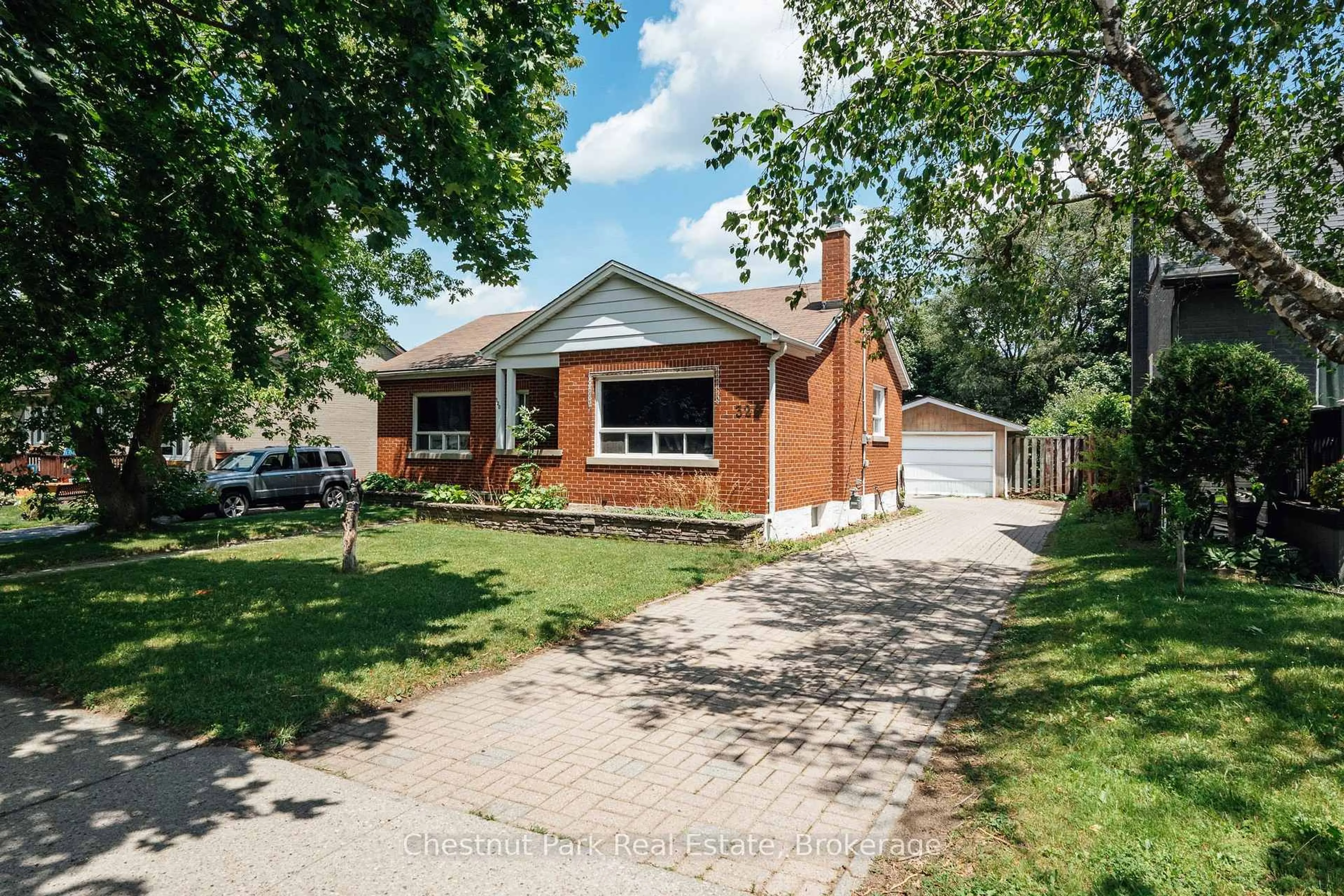 Home with brick exterior material, street for 320 St Leger St, Kitchener Ontario N2H 4M7