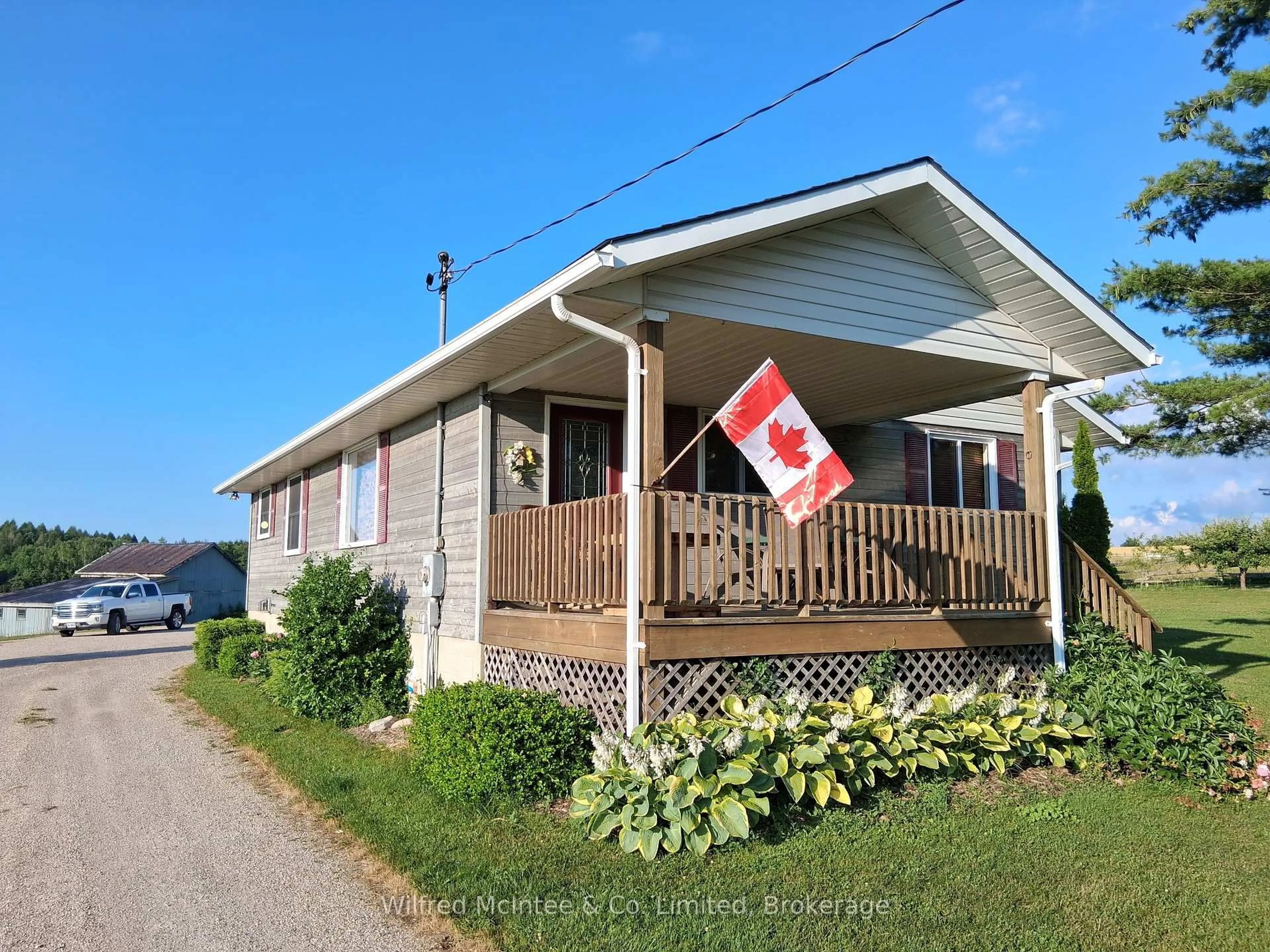 Home with vinyl exterior material, street for 932 Bruce  86 Rd, Huron-Kinloss Ontario N0G 2H0