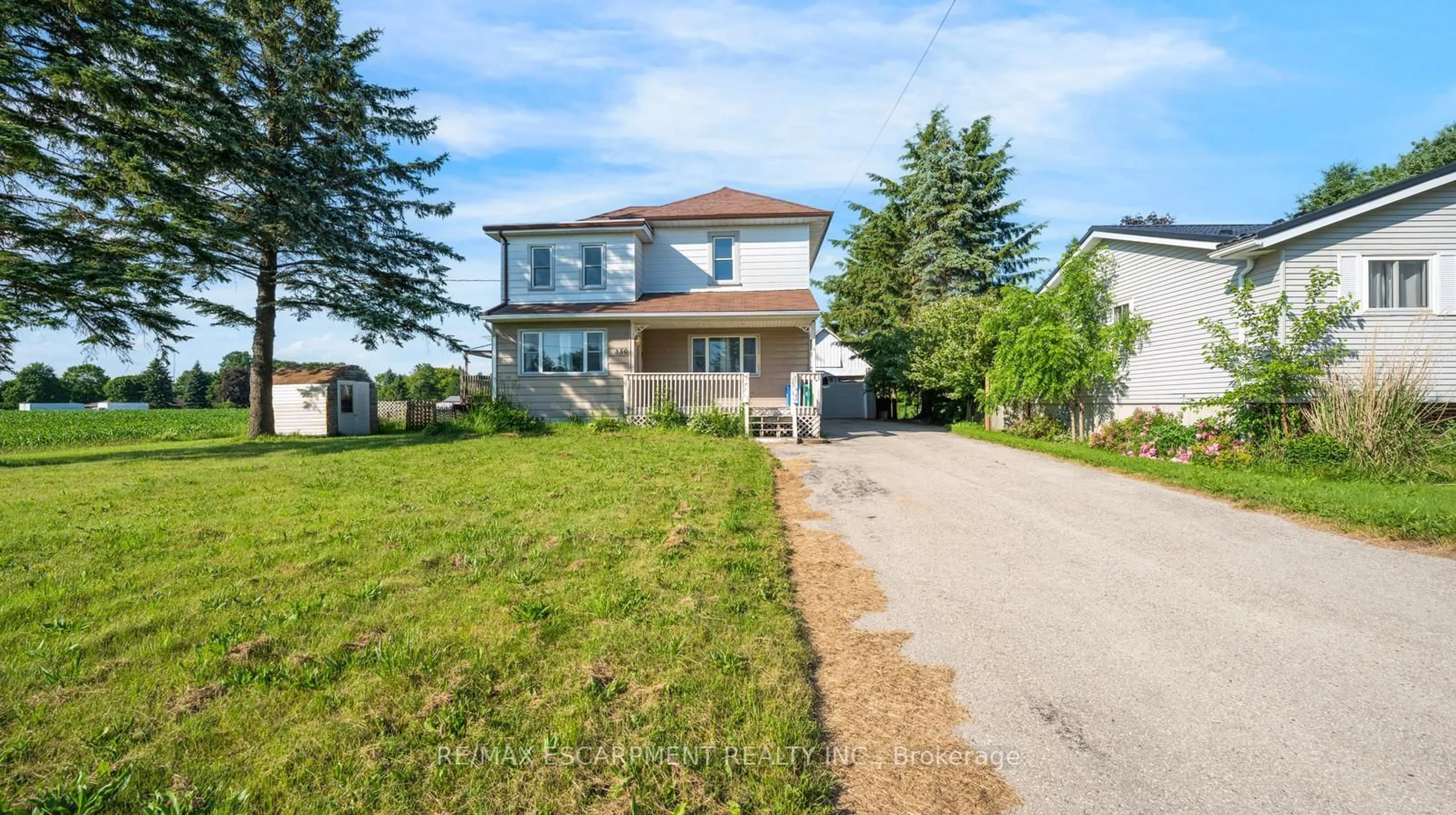 A pic from outside/outdoor area/front of a property/back of a property/a pic from drone, street for 350 Perth St, Wellington North Ontario N0G 2L1