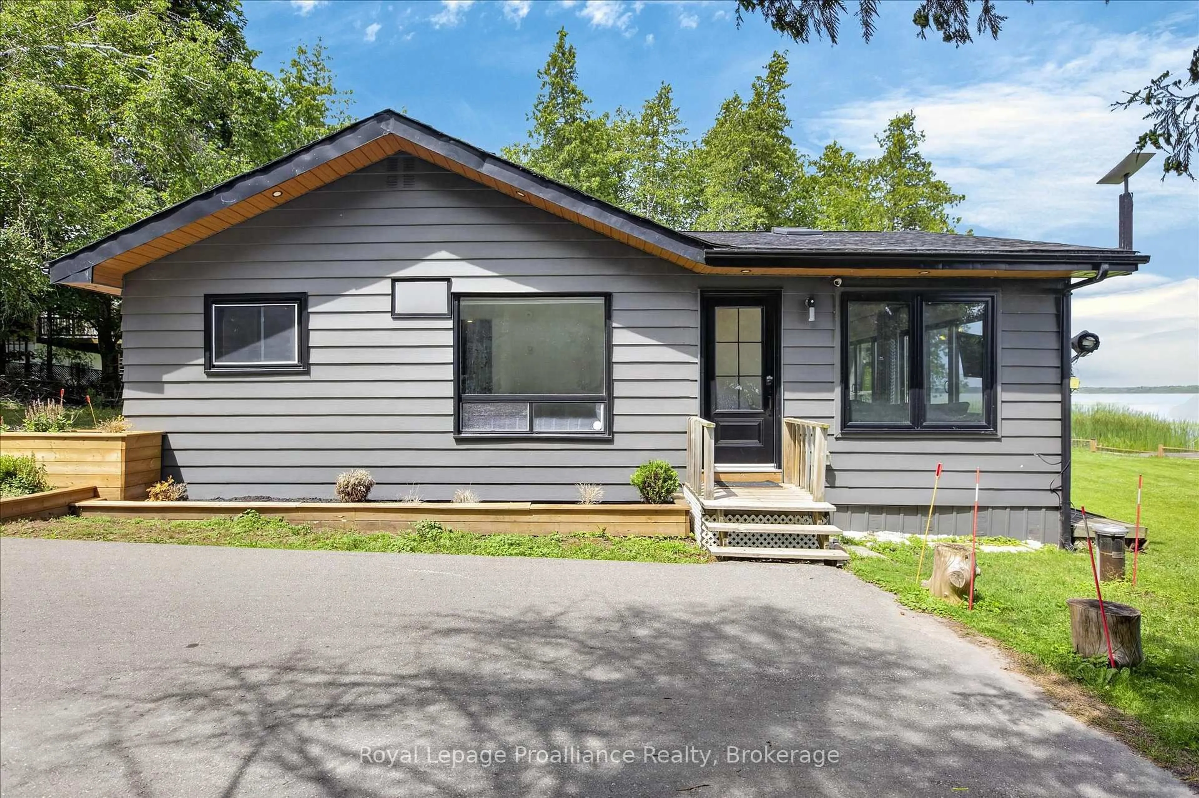 Home with vinyl exterior material, street for 18 Osprey Rd, Kawartha Lakes Ontario K9V 4R5