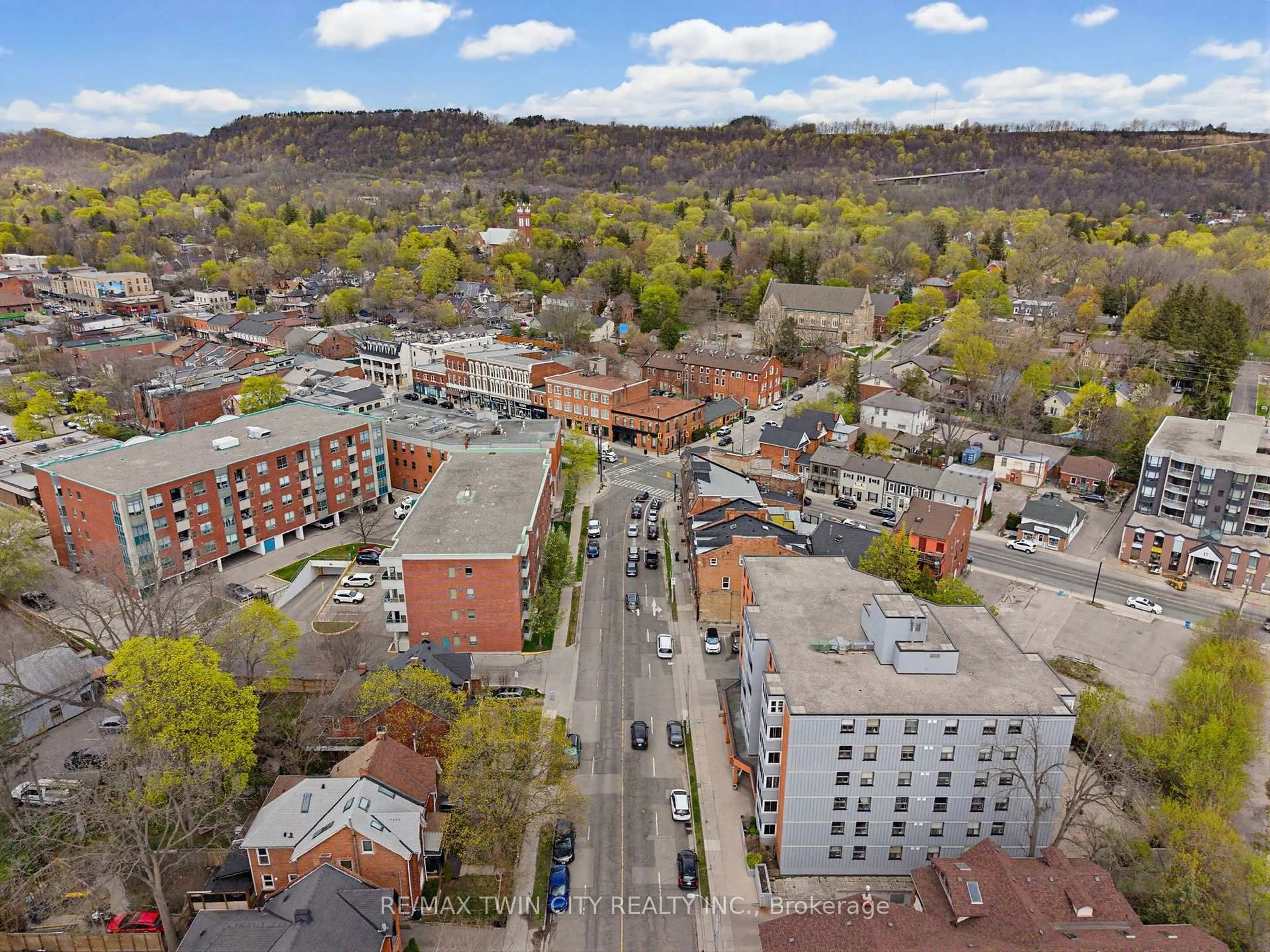 A pic from outside/outdoor area/front of a property/back of a property/a pic from drone, city buildings view from balcony for 23 Main St #203, Hamilton Ontario L9H 2P7