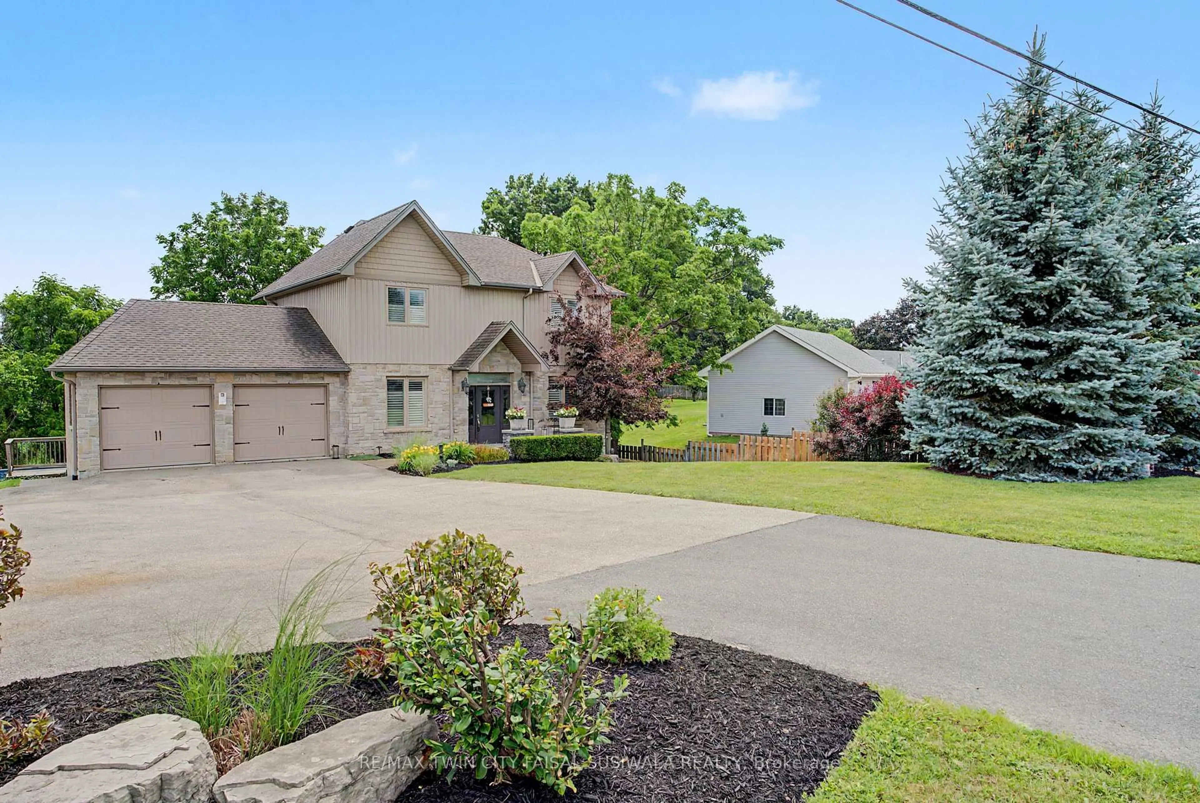 A pic from outside/outdoor area/front of a property/back of a property/a pic from drone, street for 24 Brant Rd, Brant Ontario N3L 3E1