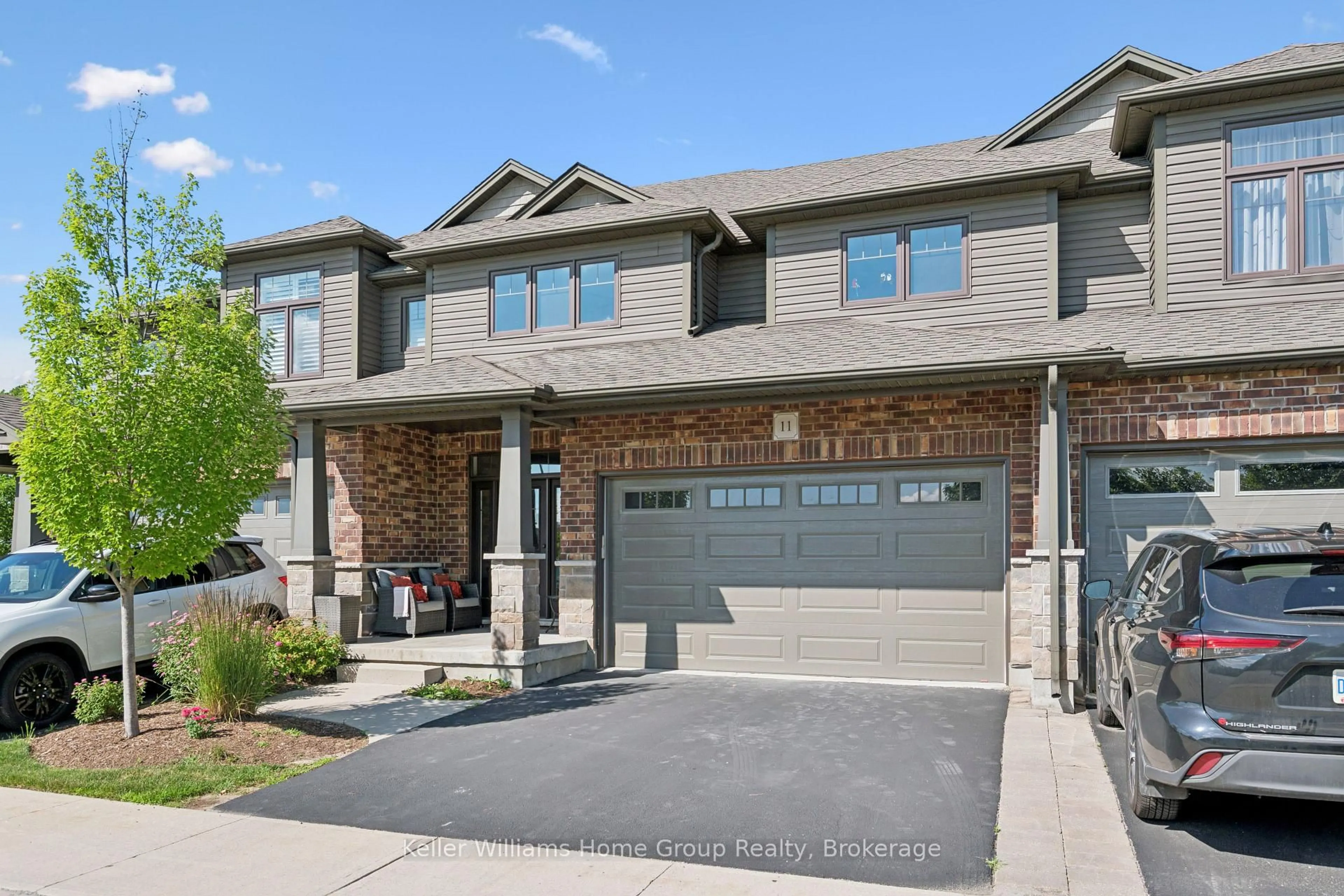 Home with brick exterior material, street for 254 Gosling Gardens Ave #11, Guelph Ontario N1L 0M4