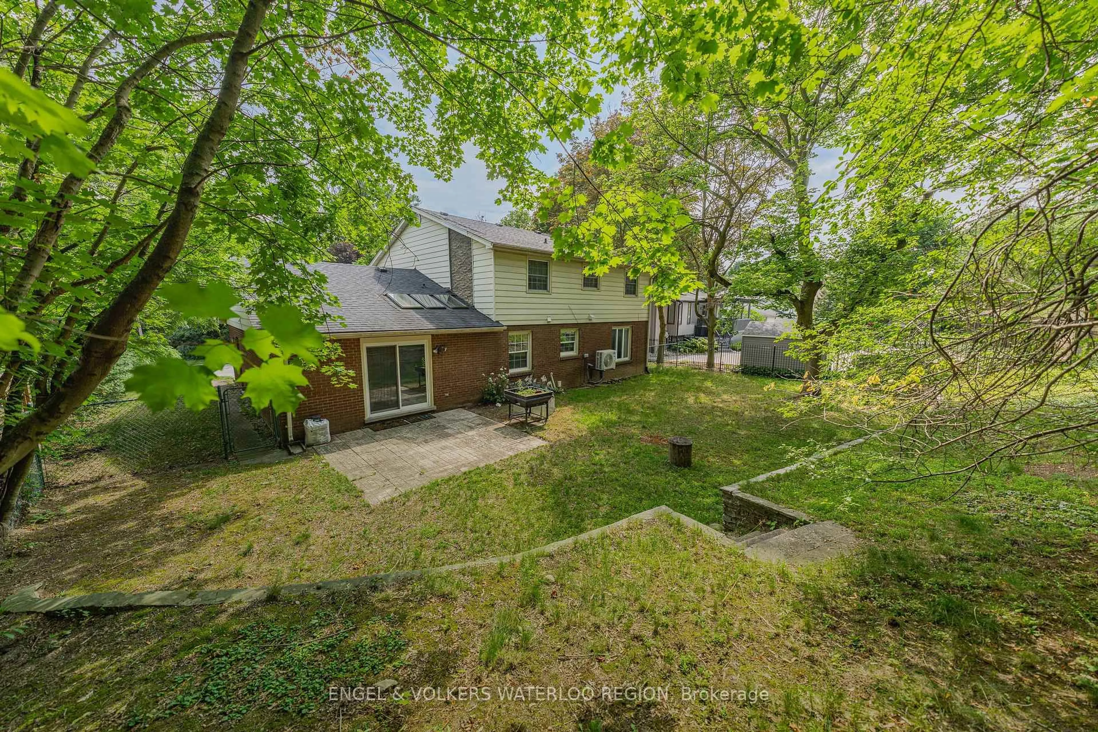A pic from outside/outdoor area/front of a property/back of a property/a pic from drone, forest/trees view for 256 Shakespeare Dr, Waterloo Ontario N2L 2T6