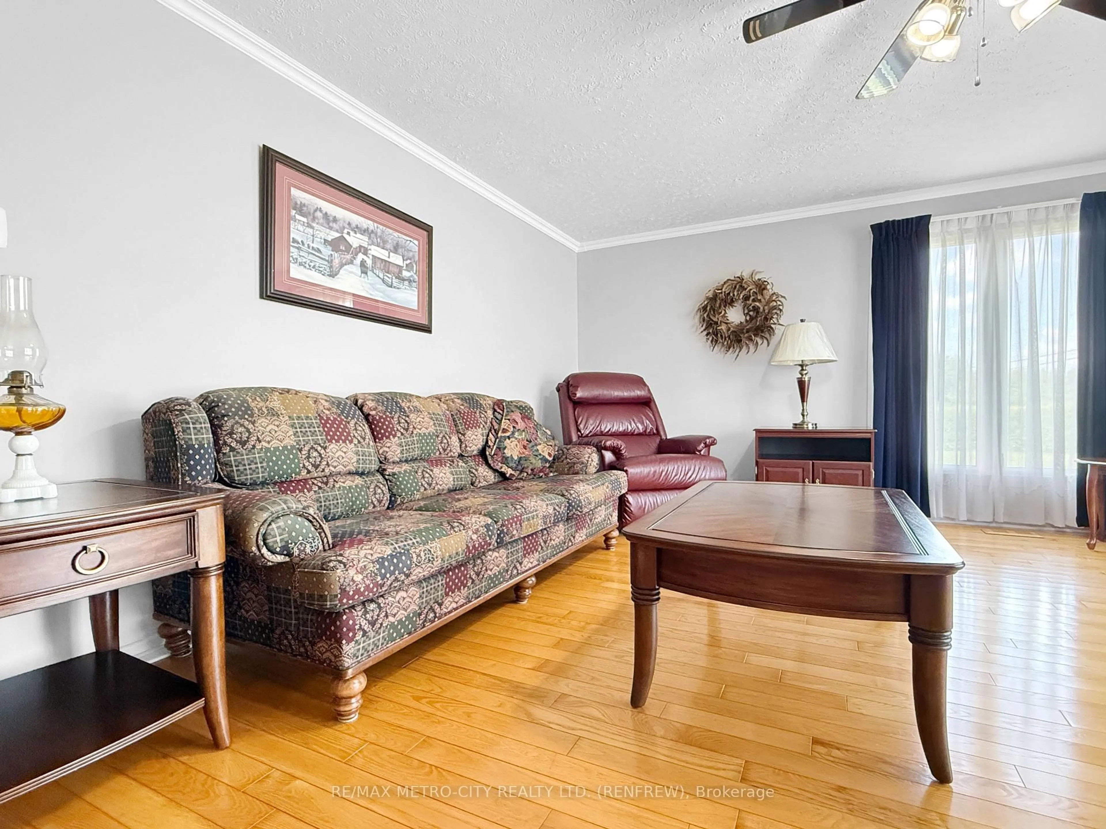 Living room with furniture, wood/laminate floor for 1247 Haley Rd, Haley Station Ontario K0J 1Y0