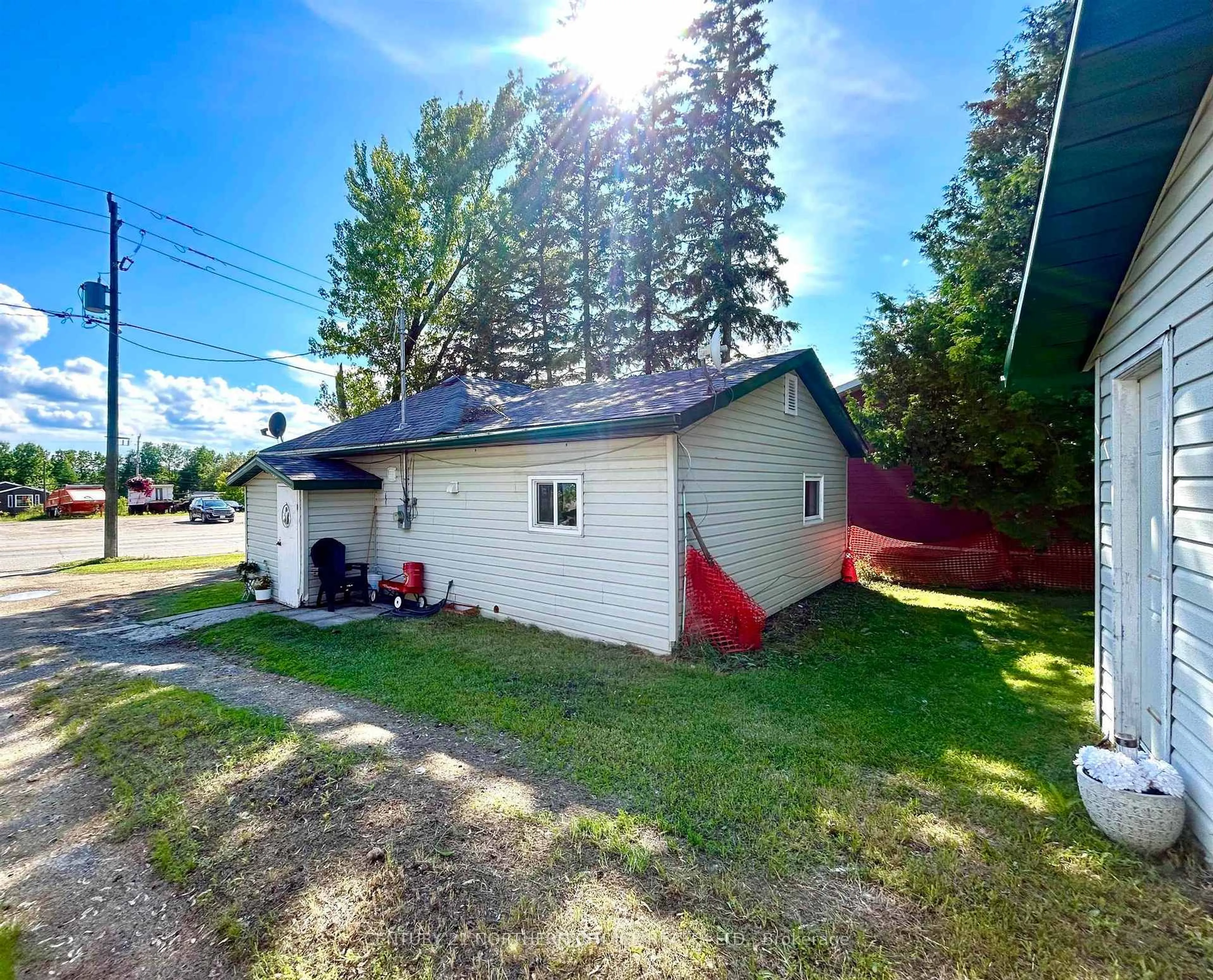 A pic from outside/outdoor area/front of a property/back of a property/a pic from drone, street for 6080 Highway 11, Emo Ontario P0W 1E0