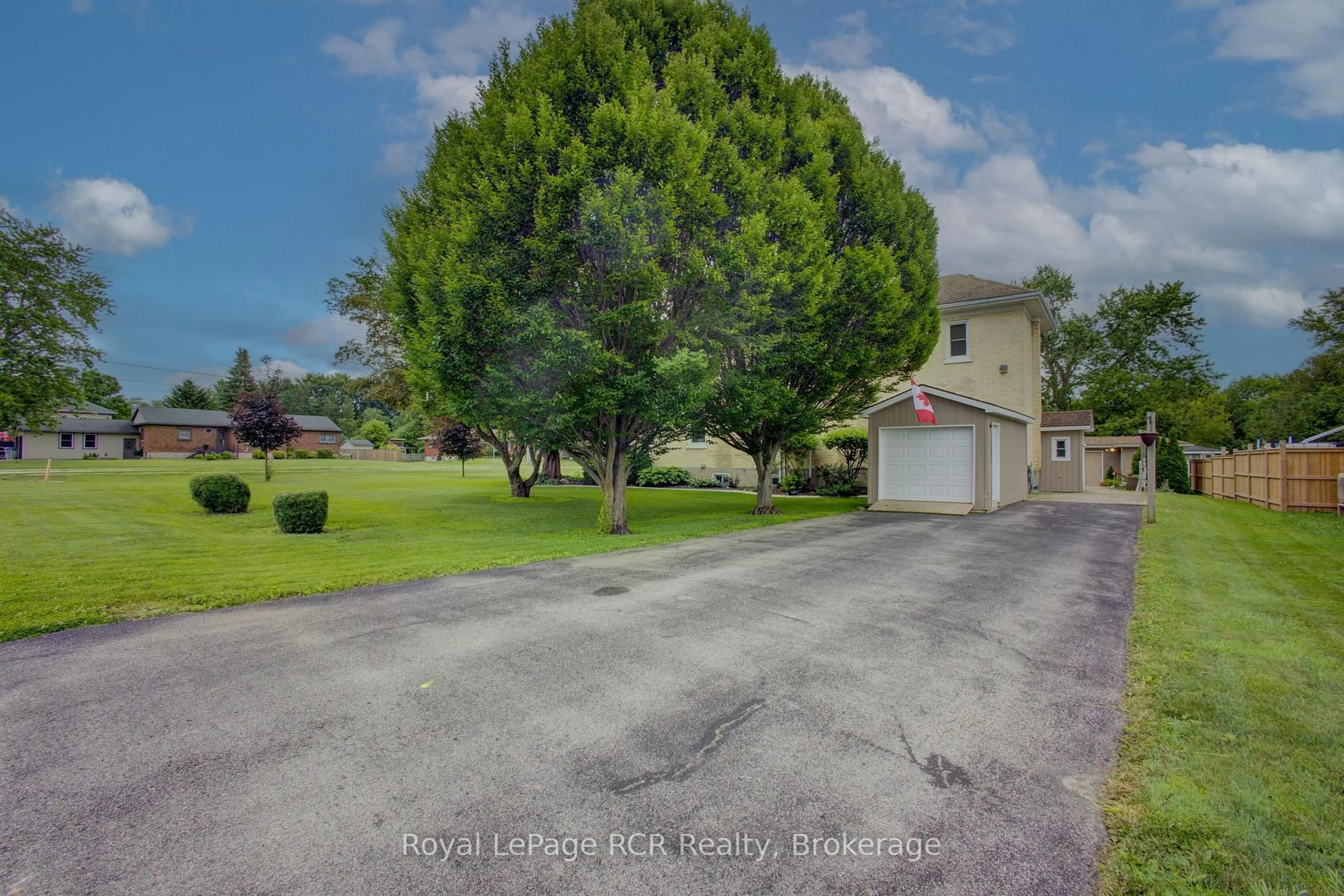 A pic from outside/outdoor area/front of a property/back of a property/a pic from drone, street for 210 St George St, West Perth Ontario N0K 1N0