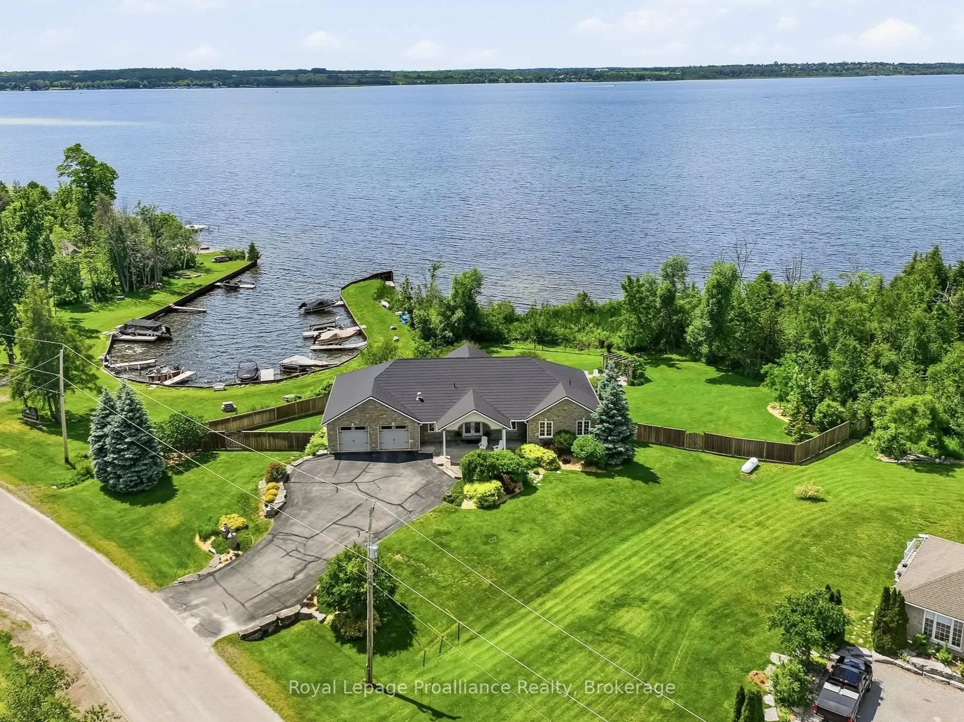 A pic from outside/outdoor area/front of a property/back of a property/a pic from drone, water/lake/river/ocean view for 1674 Morris Ave, Selwyn Ontario K0L 1T0
