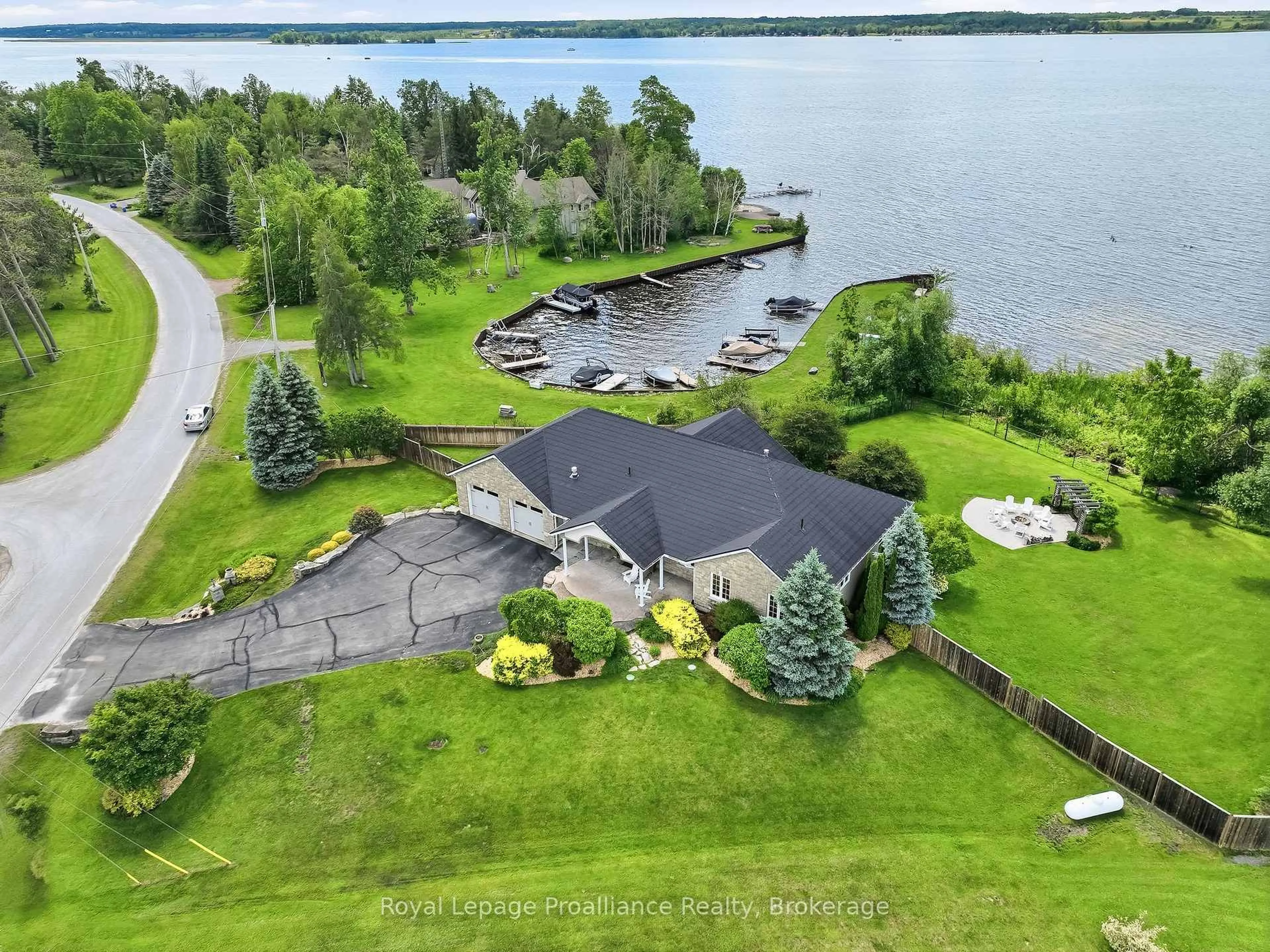 A pic from outside/outdoor area/front of a property/back of a property/a pic from drone, water/lake/river/ocean view for 1674 Morris Ave, Selwyn Ontario K0L 1T0