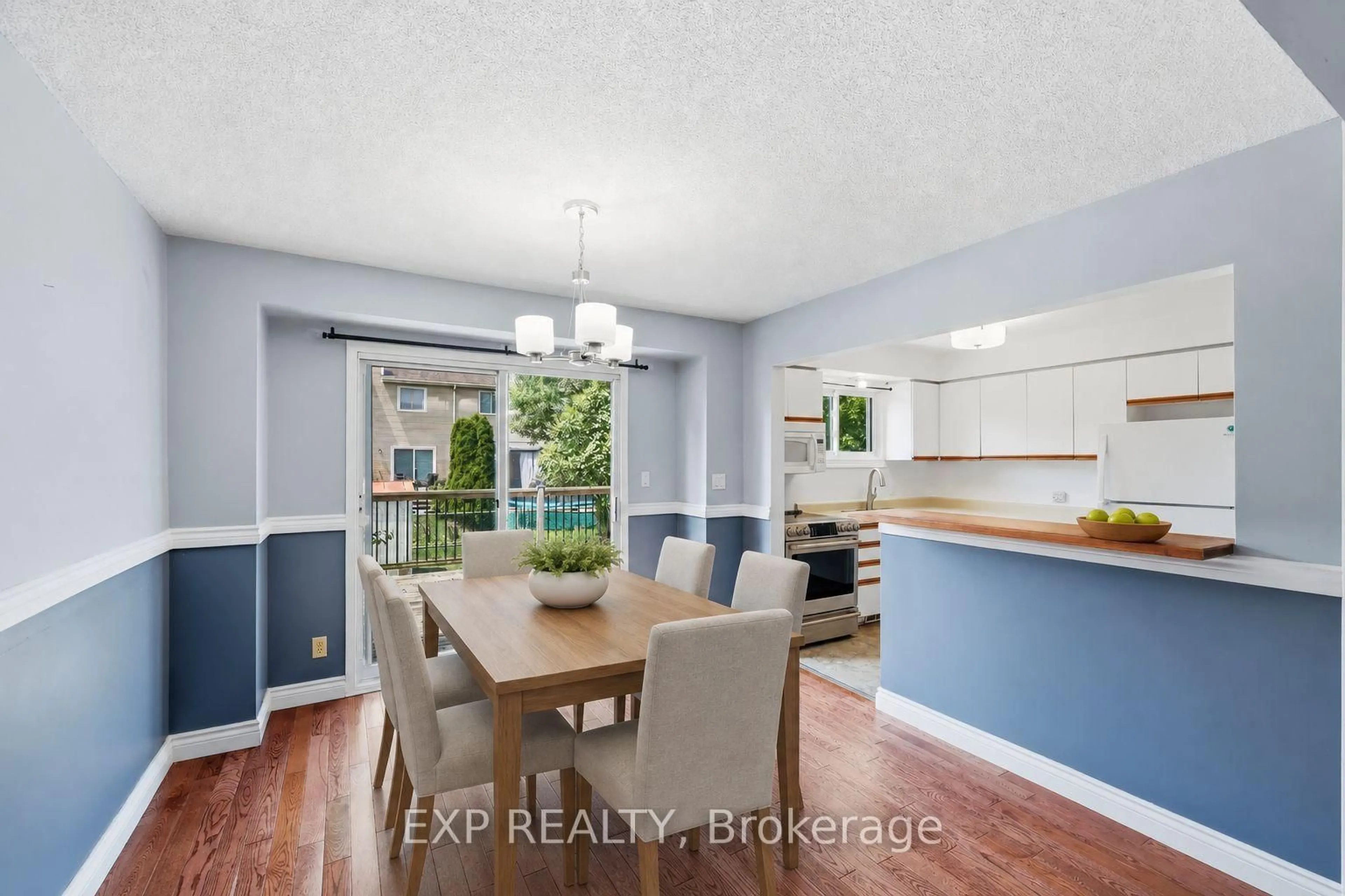 Open concept kitchen, wood/laminate floor for 793 Littlestone Cres, Kingston Ontario K7M 8L7