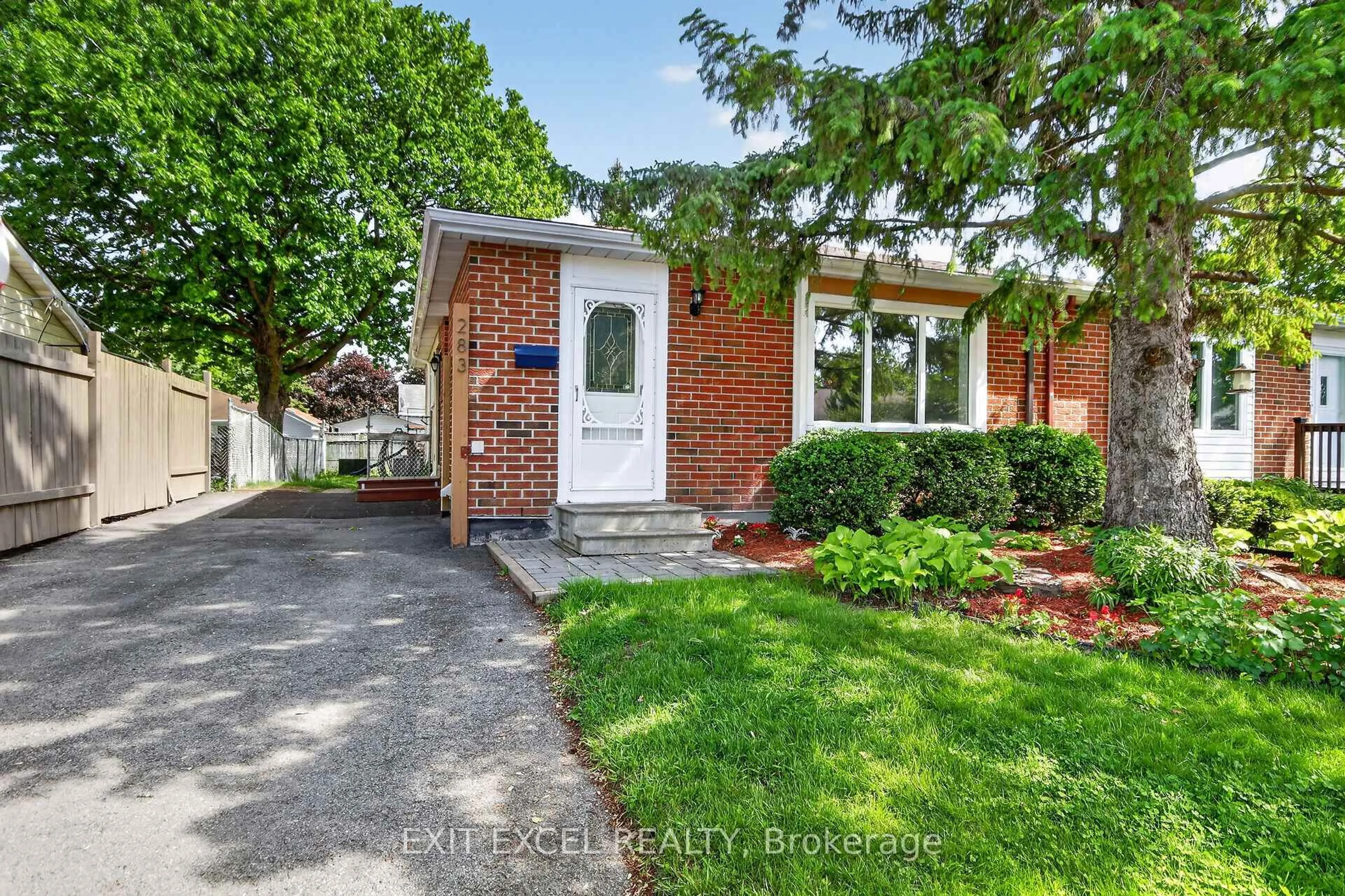 Home with brick exterior material, street for 283 McElroy Dr, Ottawa Ontario K2L 1Y3