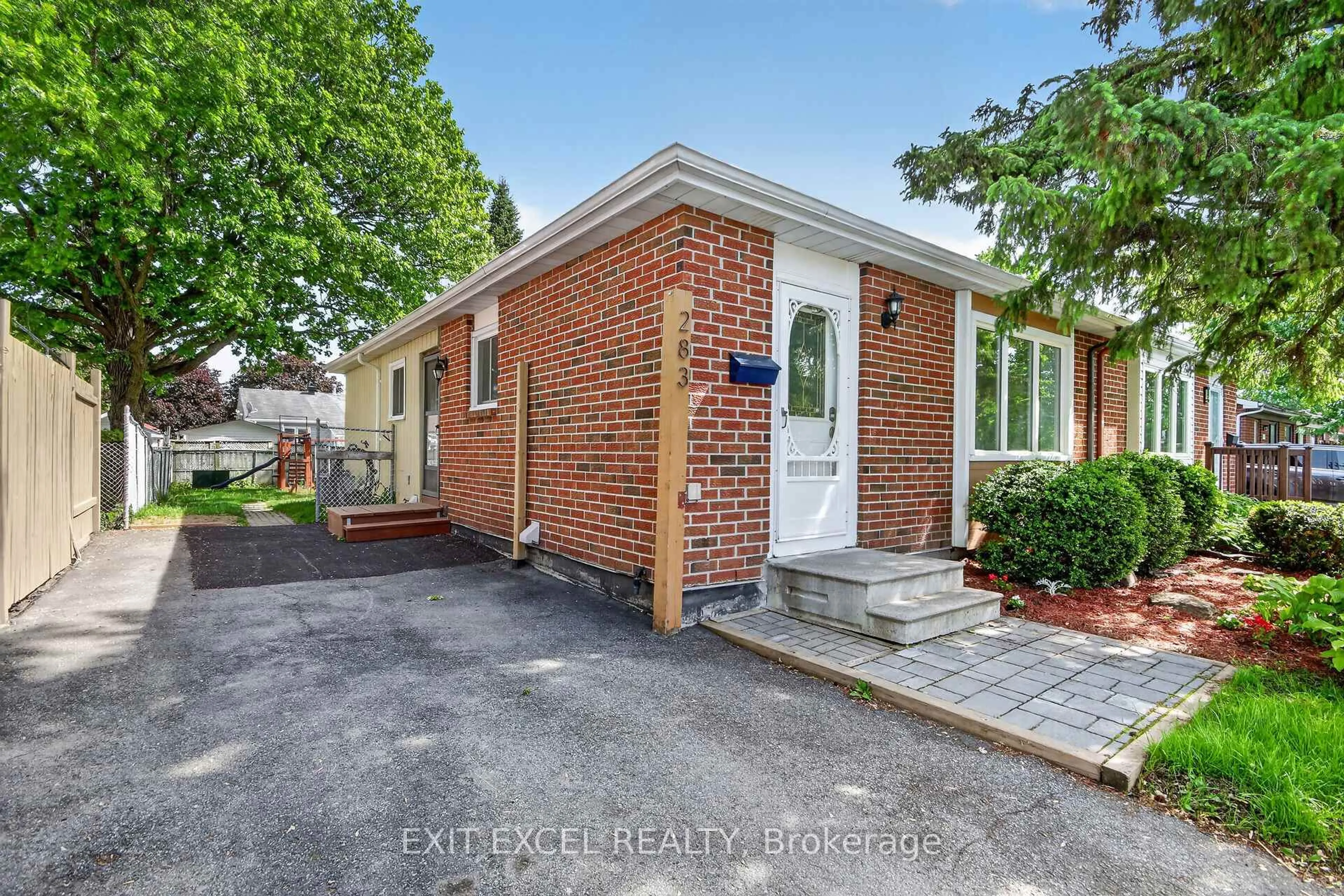 Home with brick exterior material, street for 283 McElroy Dr, Ottawa Ontario K2L 1Y3