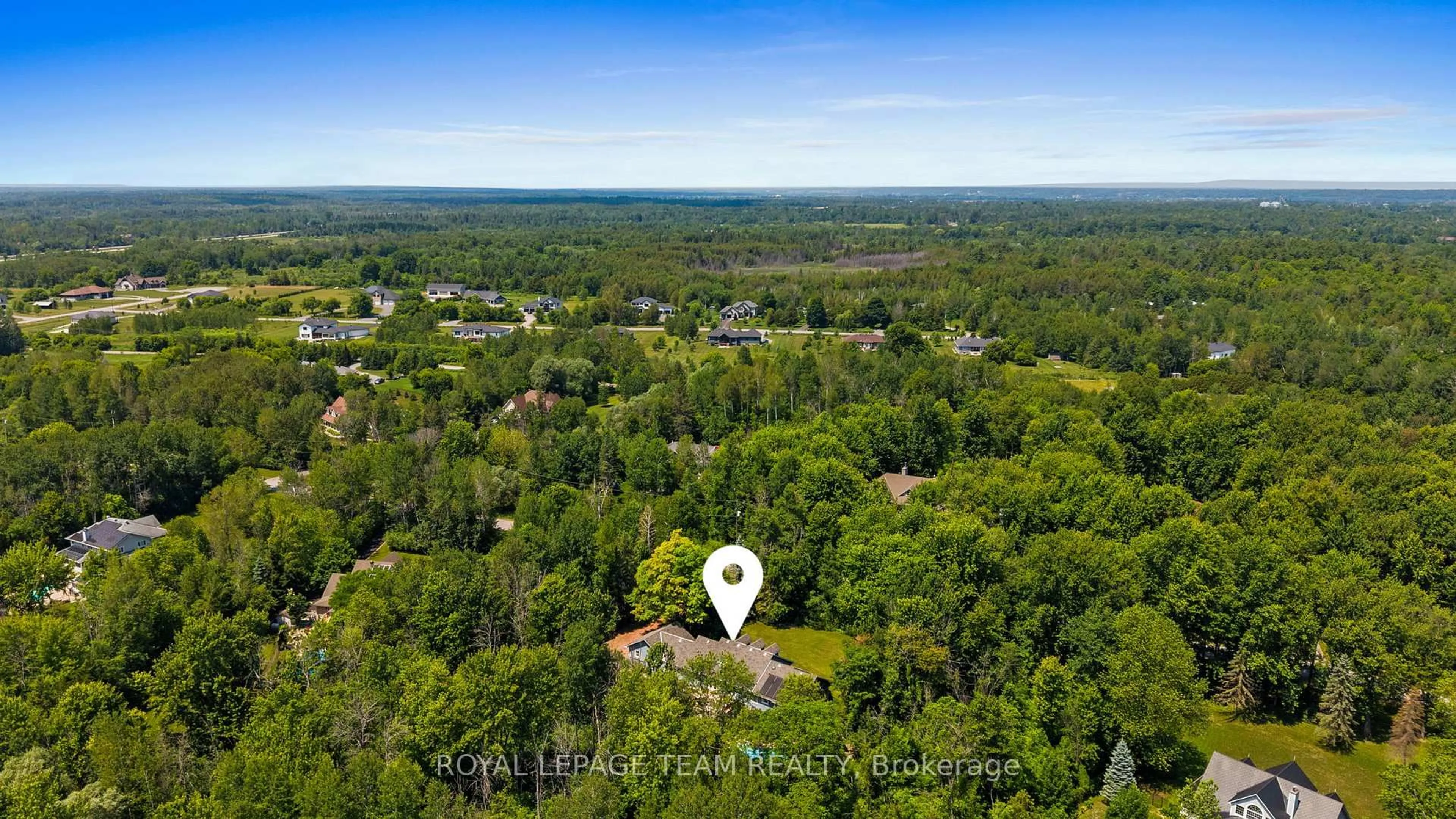 A pic from outside/outdoor area/front of a property/back of a property/a pic from drone, forest/trees view for 113 Wilbert Cox Dr, Carp Ontario K0A 1L0
