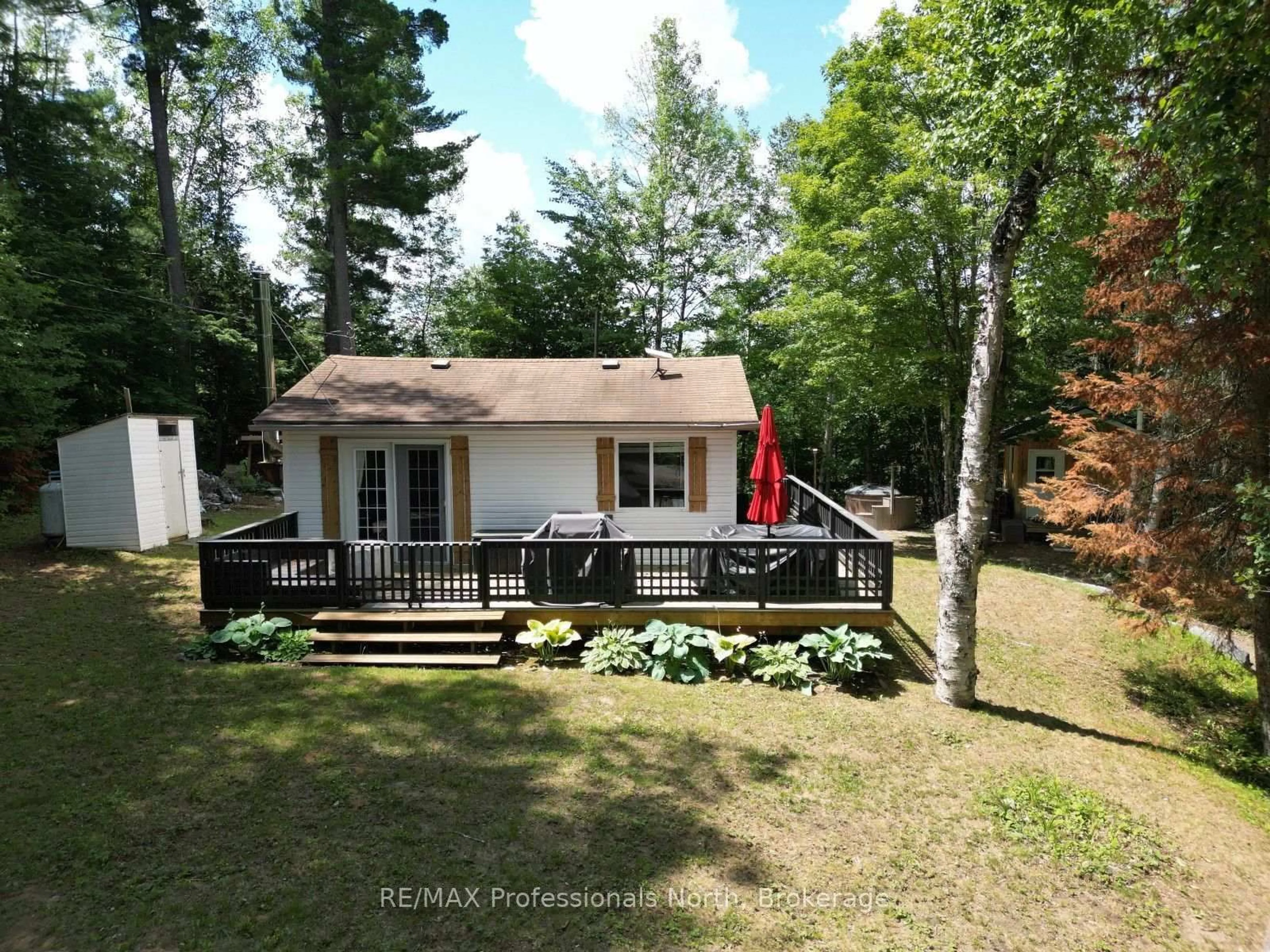 A pic from outside/outdoor area/front of a property/back of a property/a pic from drone, forest/trees view for 1419 Clement Lake Rd, Highlands East Ontario K0L 3C0