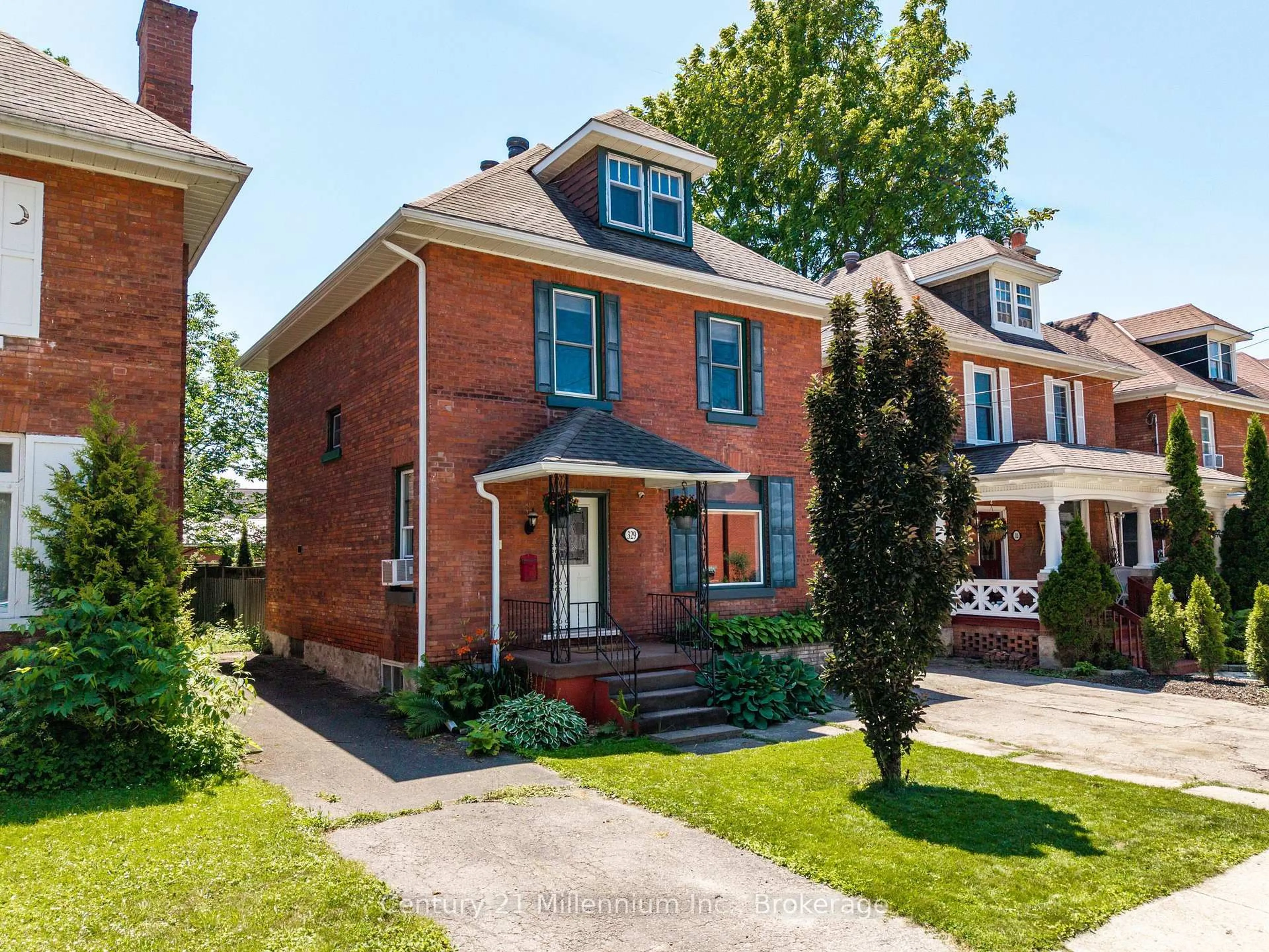 Home with brick exterior material, street for 329 7th St, Owen Sound Ontario N4K 1J1
