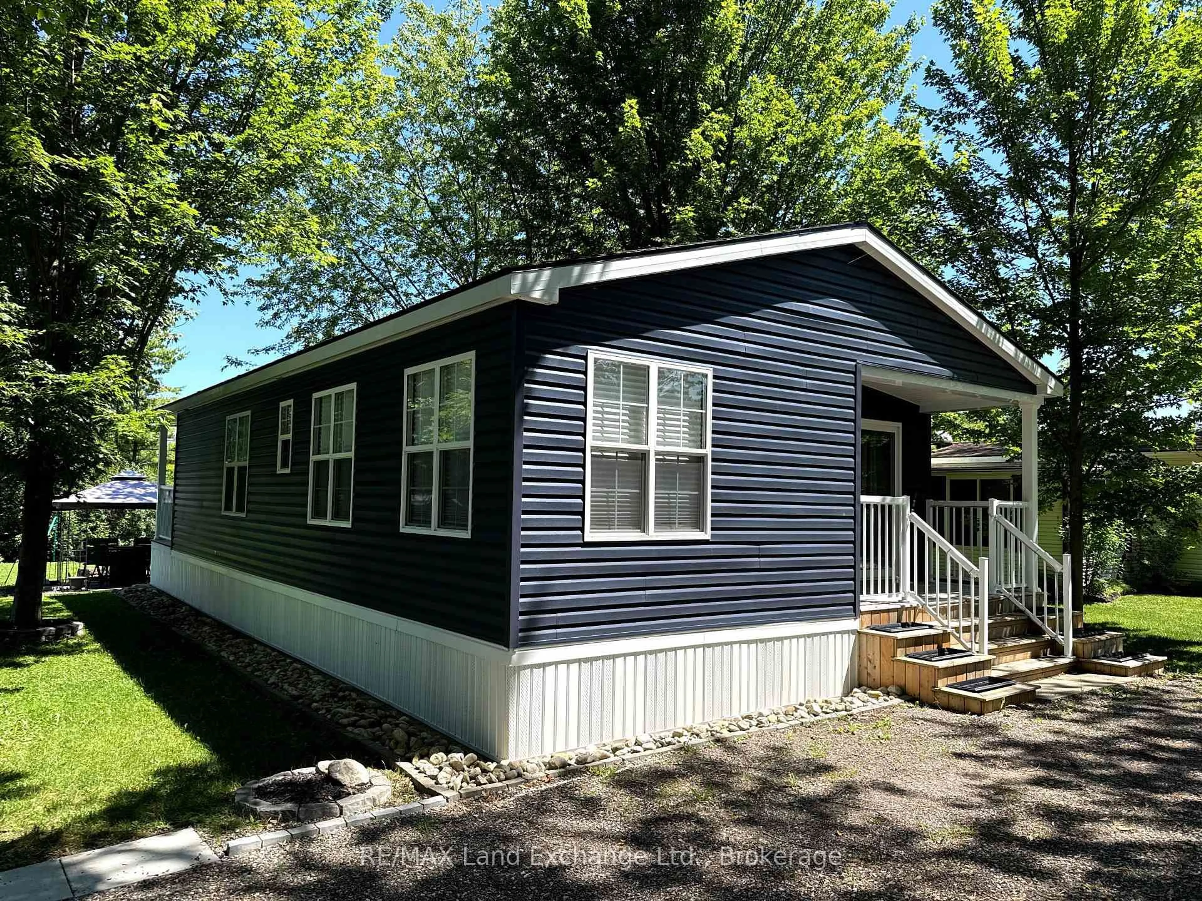Home with vinyl exterior material, street for 13 Southline Ave #A51, Huron-Kinloss Ontario N2Z 2X5
