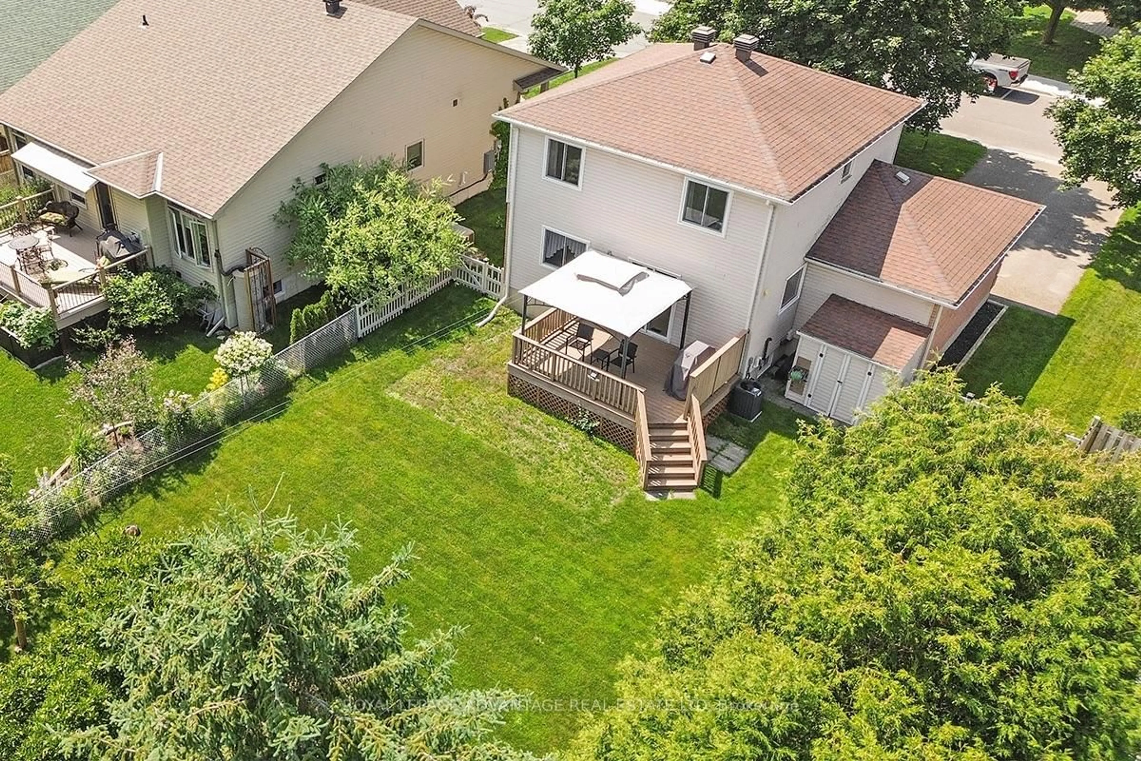 A pic from outside/outdoor area/front of a property/back of a property/a pic from drone, unknown for 14 Treelawn Blvd, Perth Ontario K7H 3L9