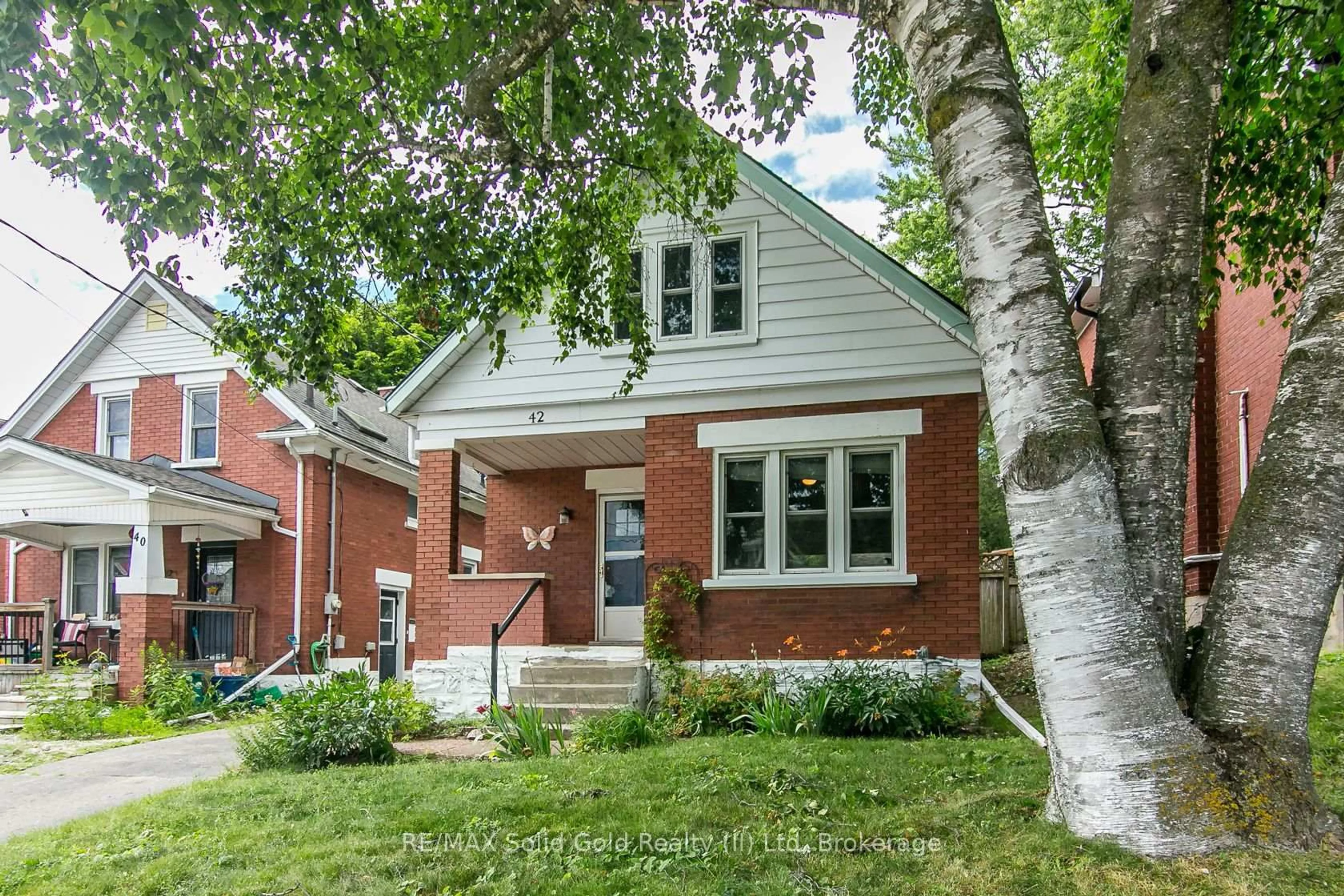 Home with brick exterior material, street for 42 Guelph St, Kitchener Ontario N2H 5W8